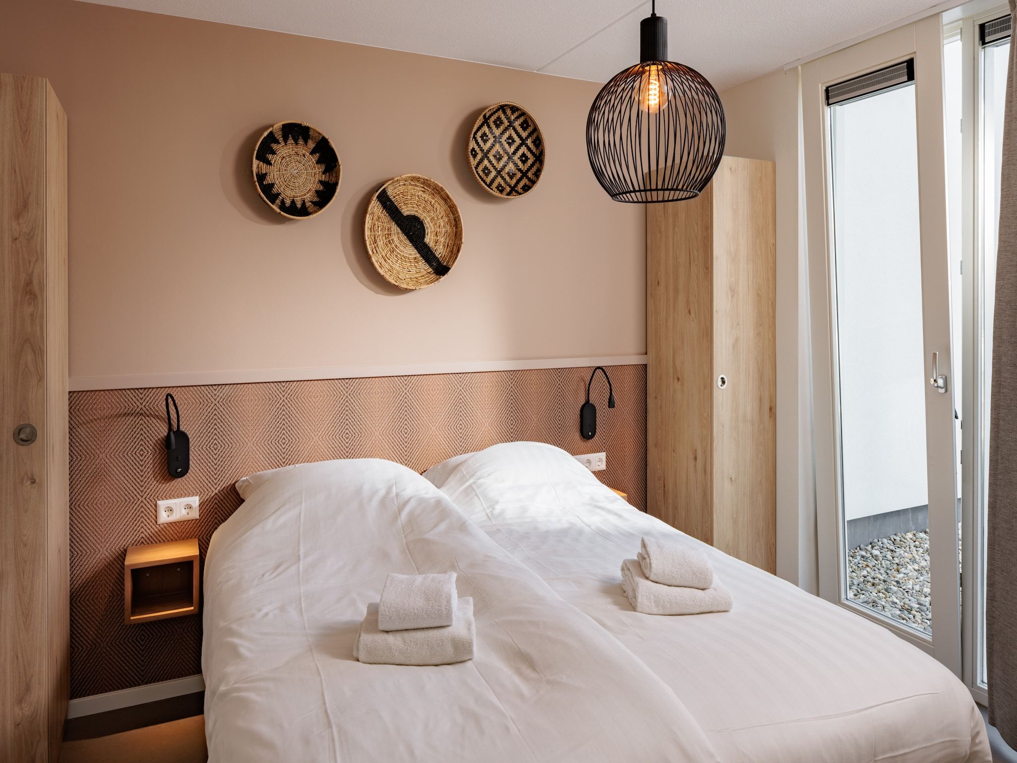 Een slaapkamer van Duinresort Dunimar 4 in Noordwijkerhout