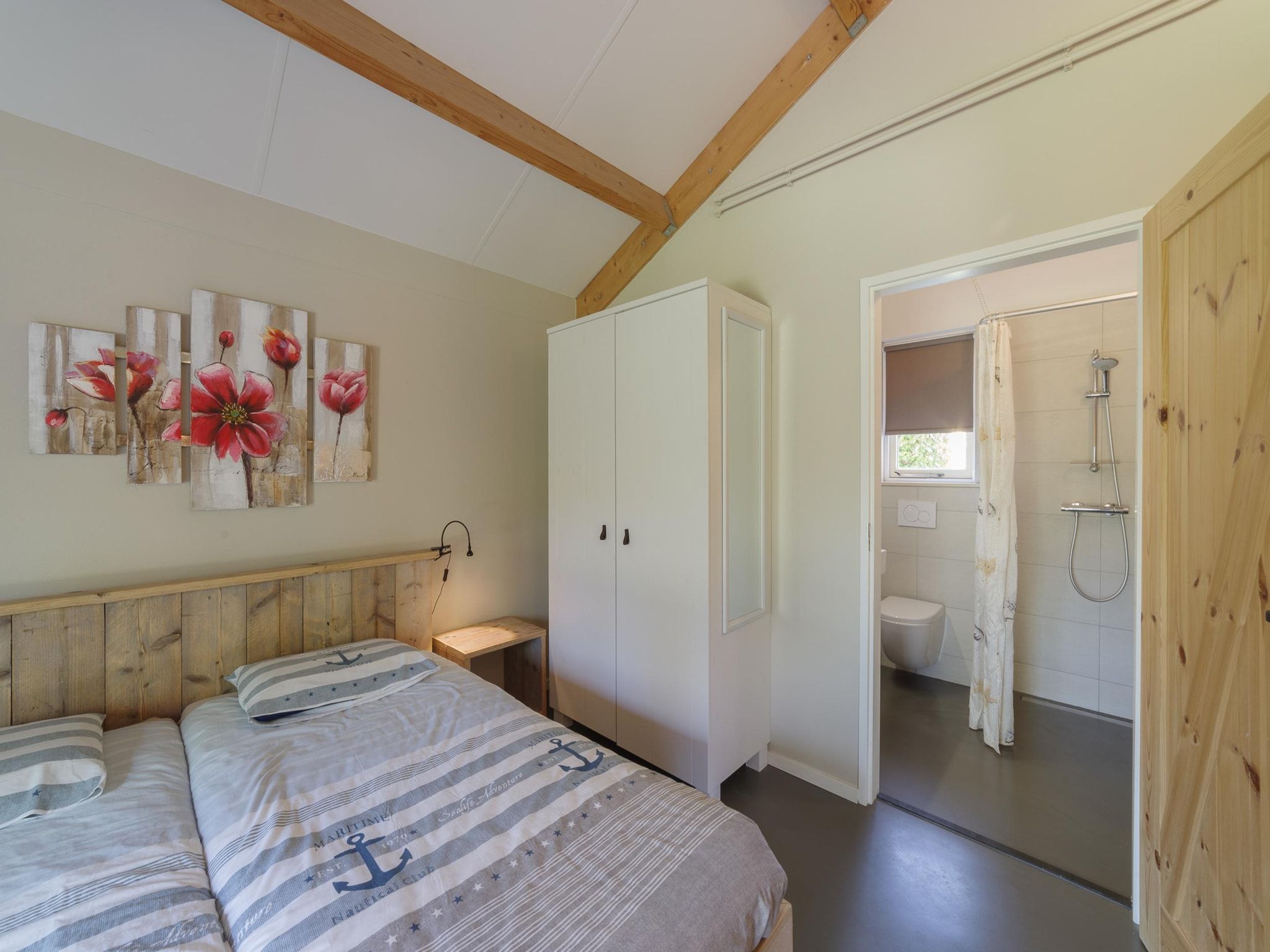 Een slaapkamer van Villapark De Oesterbaai 74 in Wemeldinge