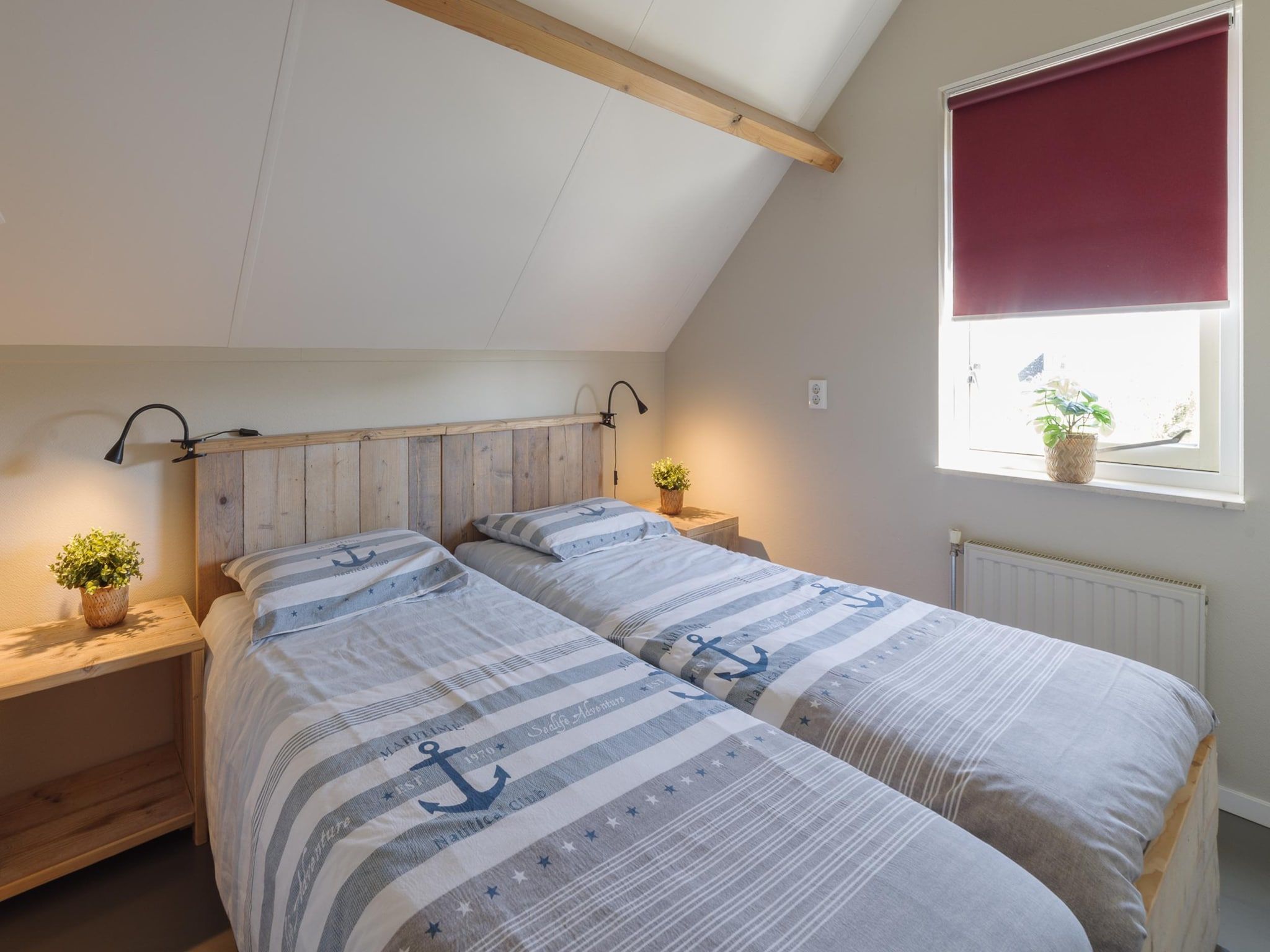 Een slaapkamer van Villapark De Oesterbaai 74 in Wemeldinge