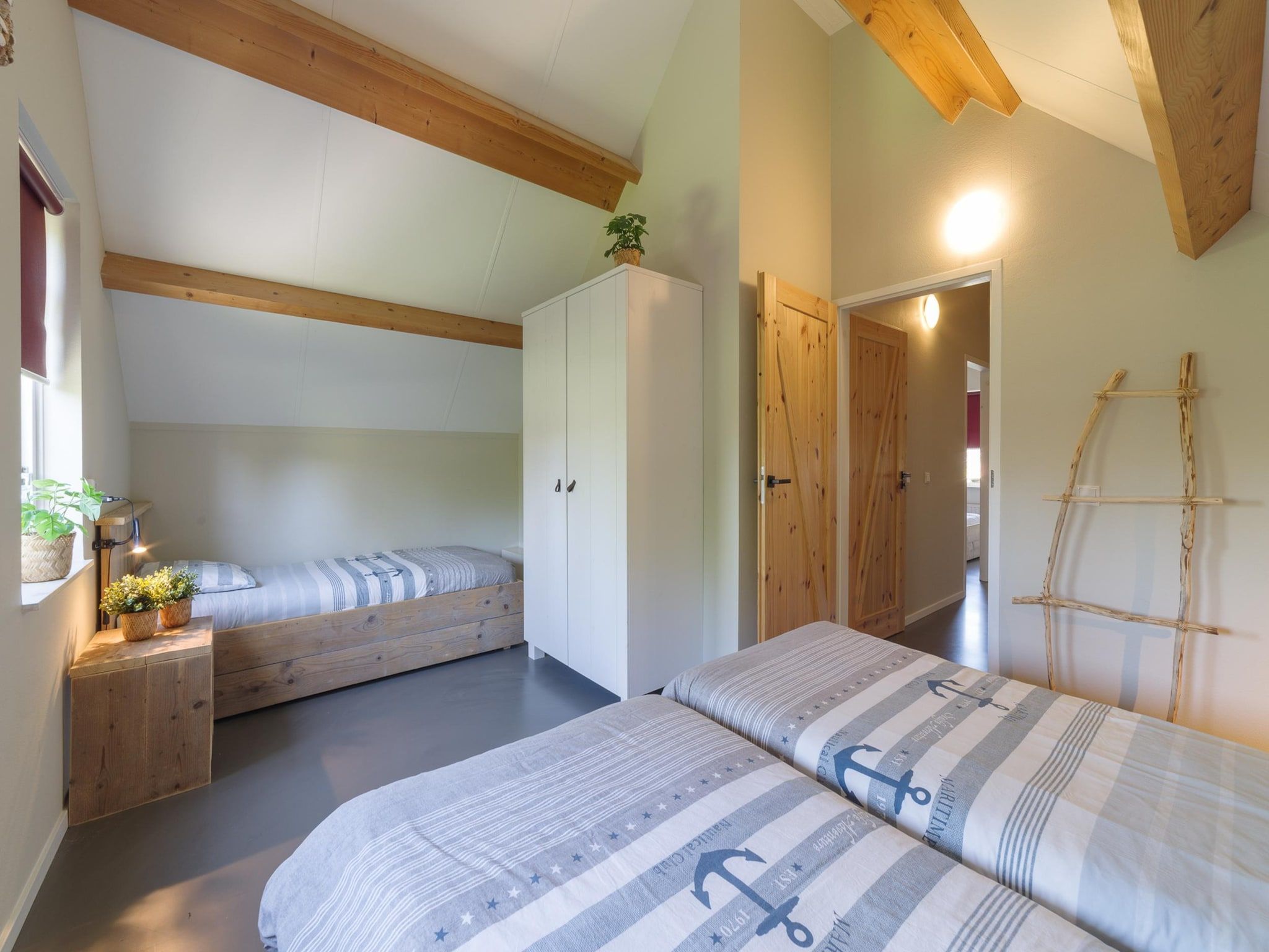 Een slaapkamer van Villapark De Oesterbaai 74 in Wemeldinge