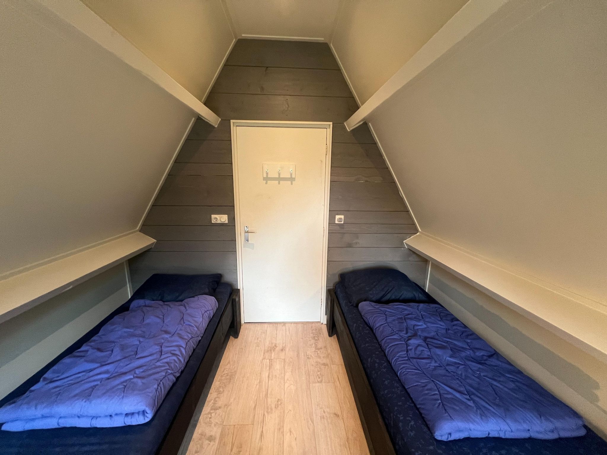 Een slaapkamer van Combi bungalow Vosseven 84 & 85 in Stramproy