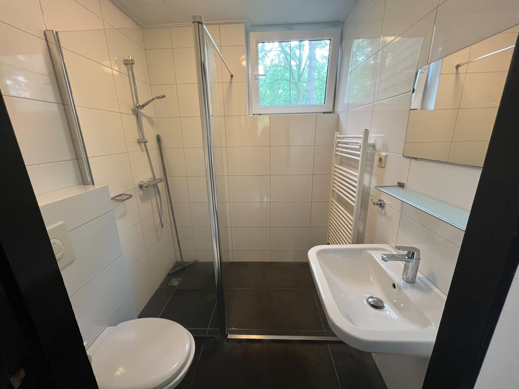 De badkamer van Combi bungalow Vosseven 84 & 85 in Stramproy