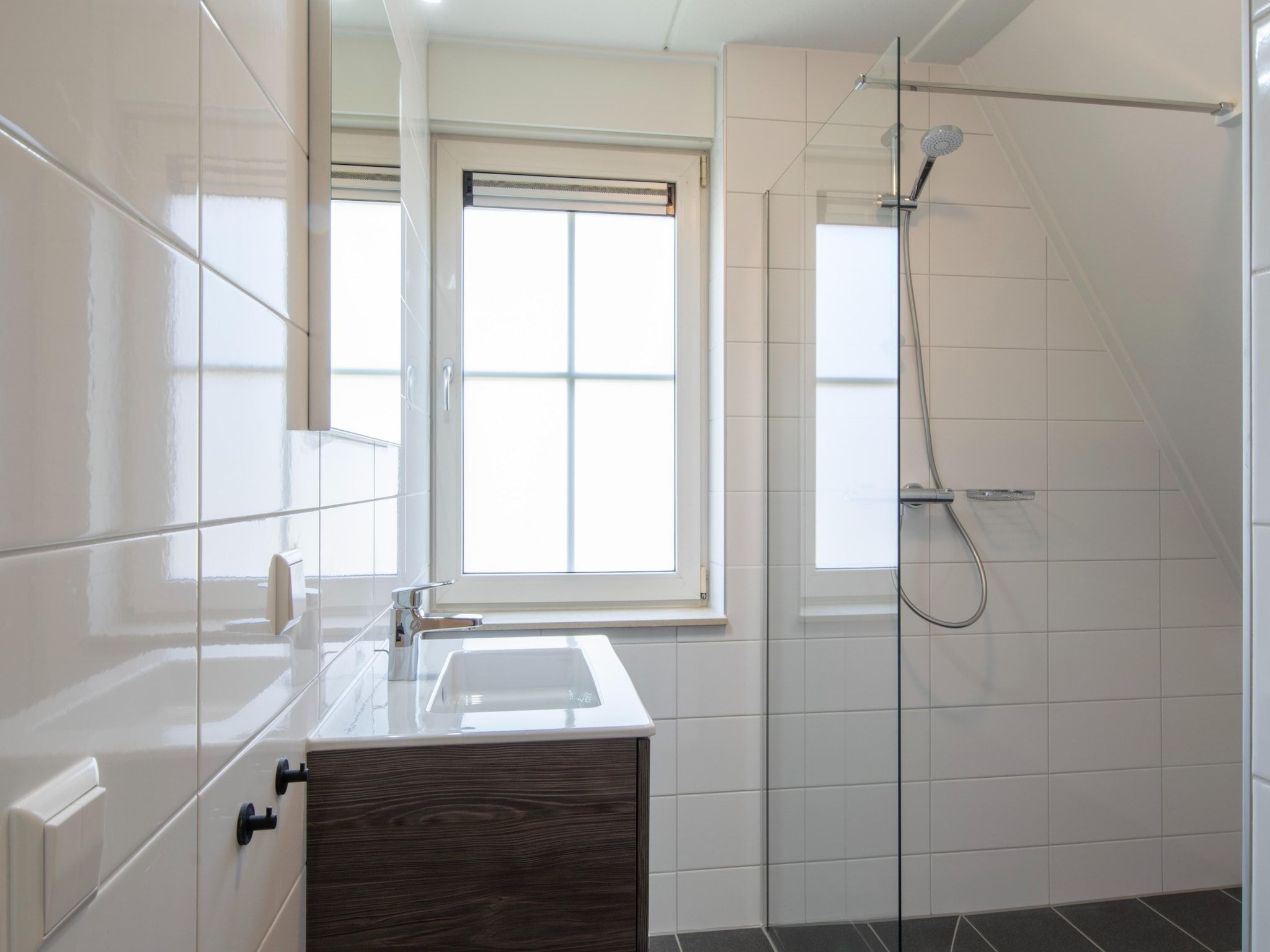 De badkamer van Vakantiepark de Katjeskelder 24 in Oosterhout