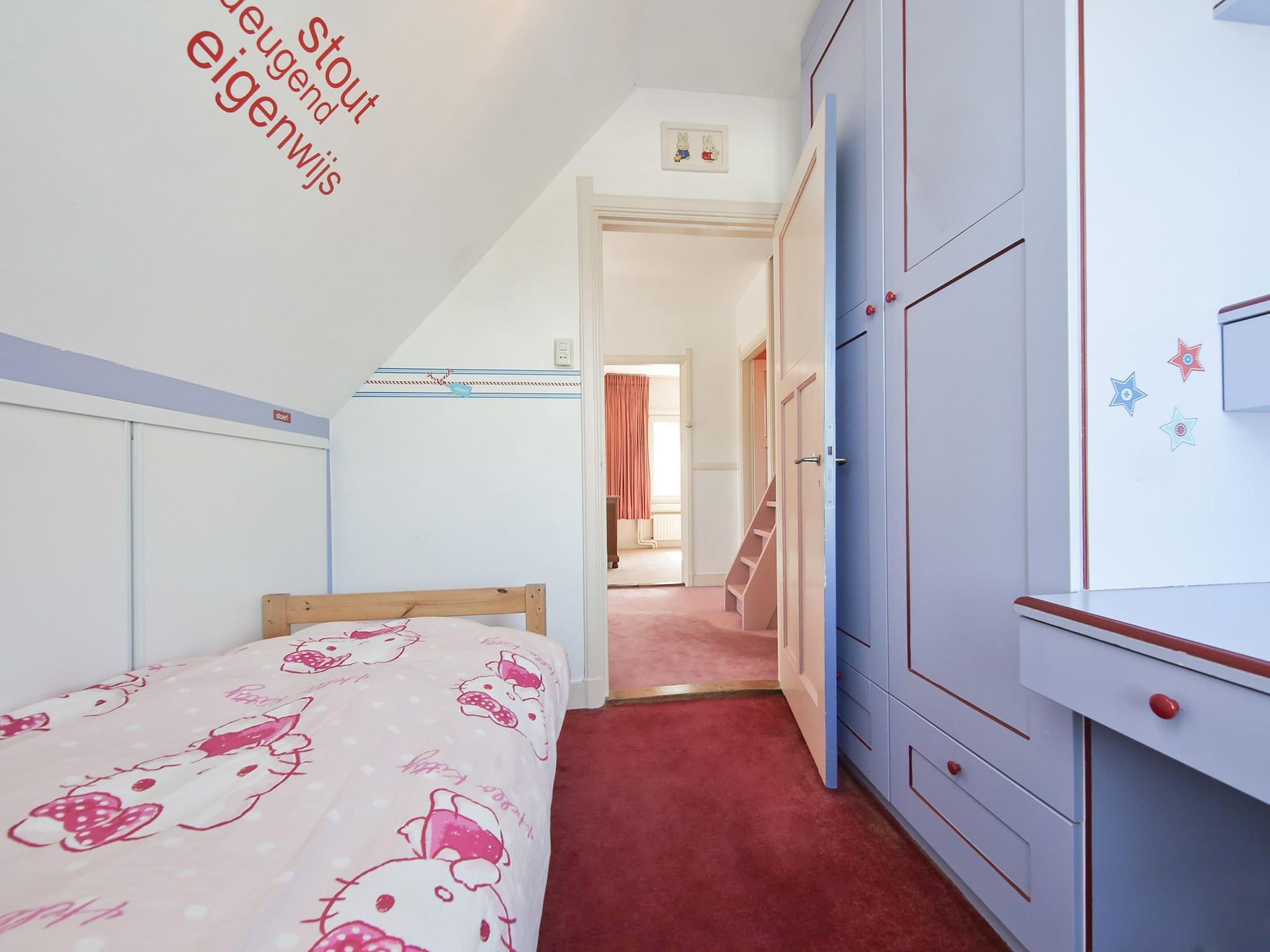 Een slaapkamer van Karakteristiek landhuis met sauna in Noord-Holland