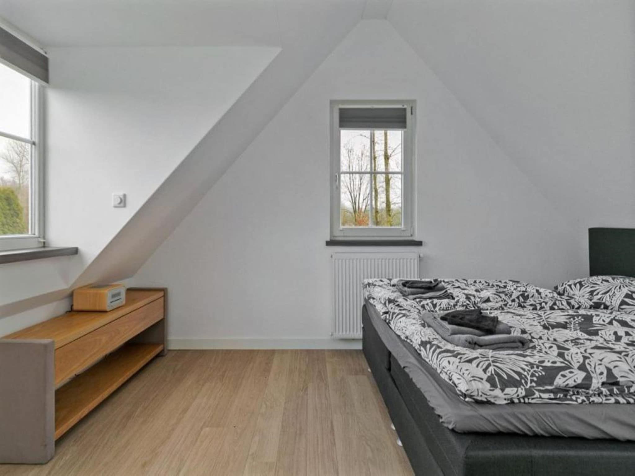 Een slaapkamer van Villa Bosrijk in Zeewolde