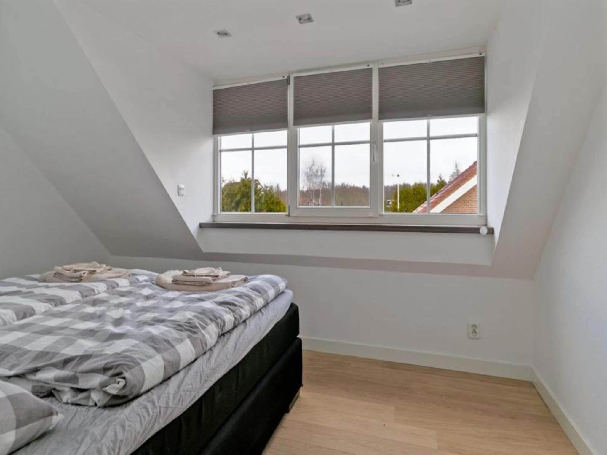 Een slaapkamer van Villa Bosrijk in Zeewolde