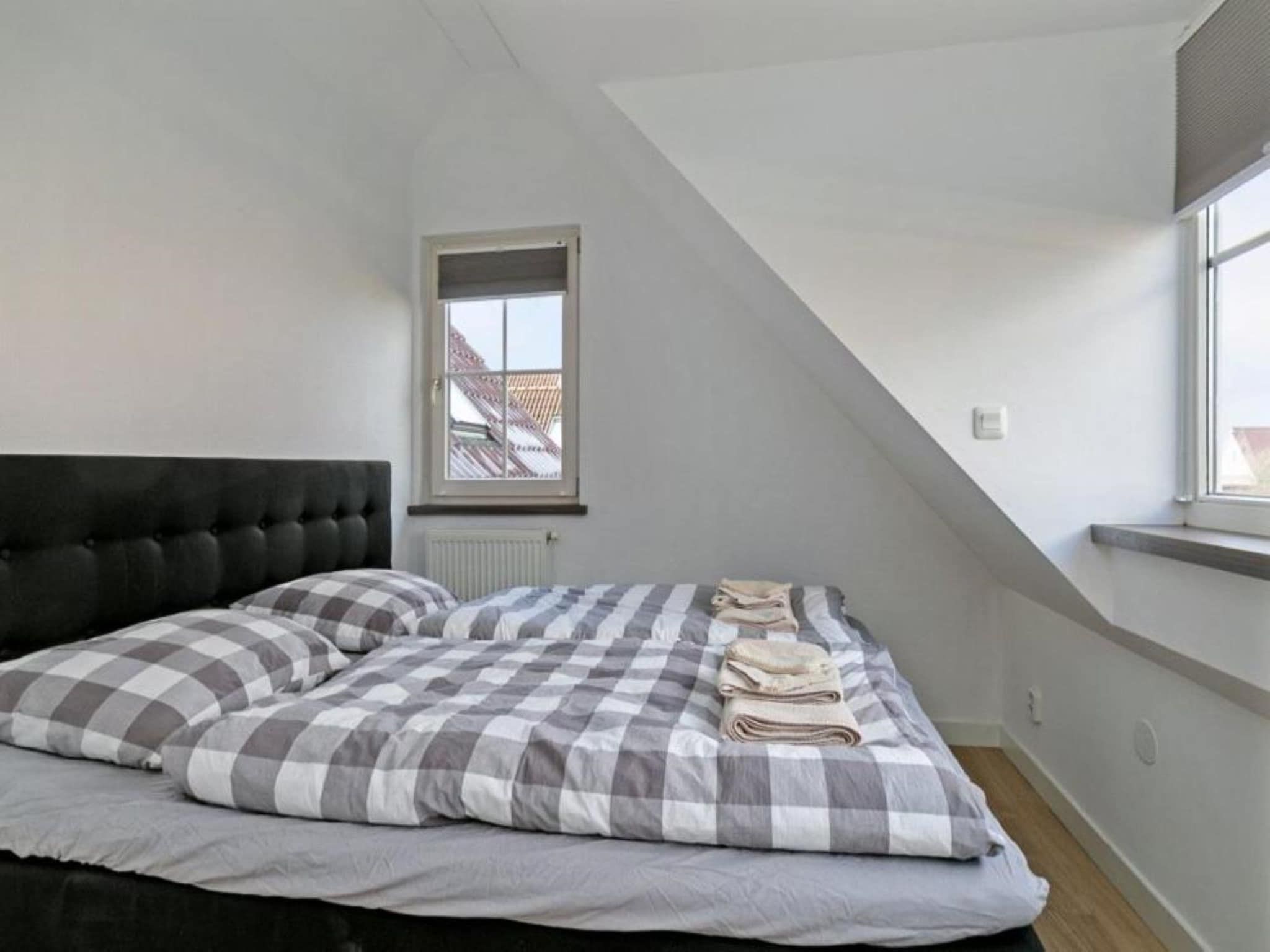 Een slaapkamer van Villa Bosrijk in Zeewolde