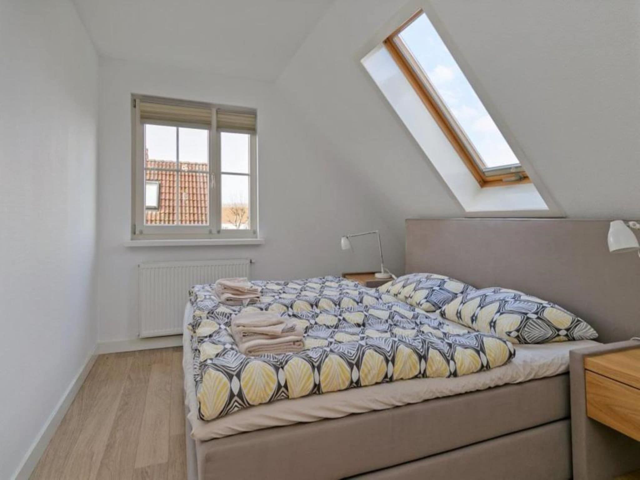 Een slaapkamer van Villa Bosrijk in Zeewolde