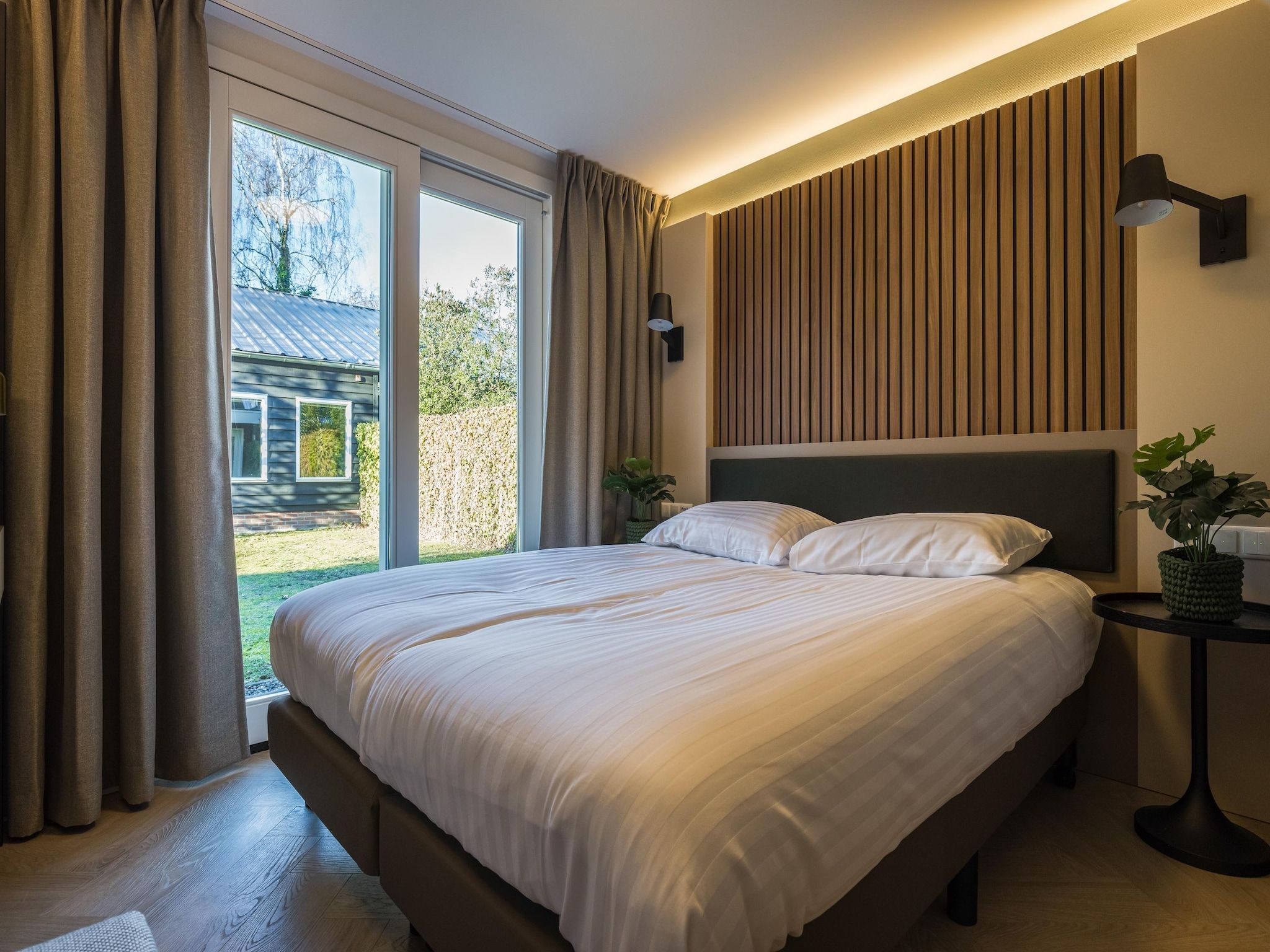 Een slaapkamer van Vakantiepark Latour 7 in Oirschot