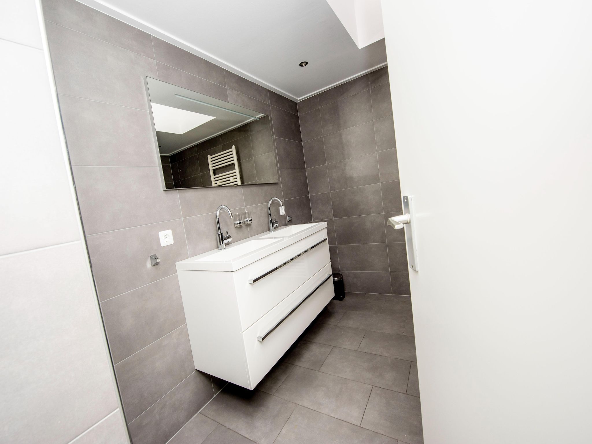 De badkamer van Villa aan het water in Terherne in Terherne