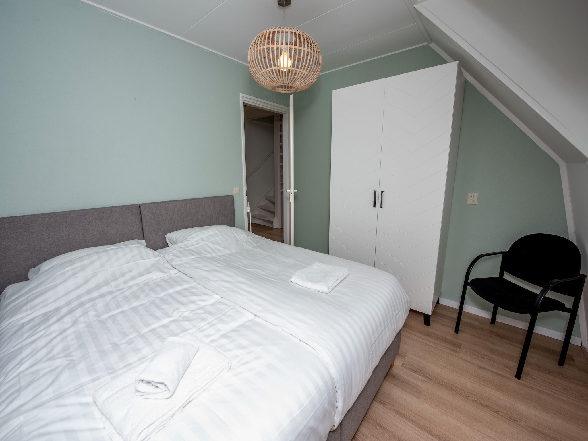 Een slaapkamer van Villa aan het water in Terherne in Terherne