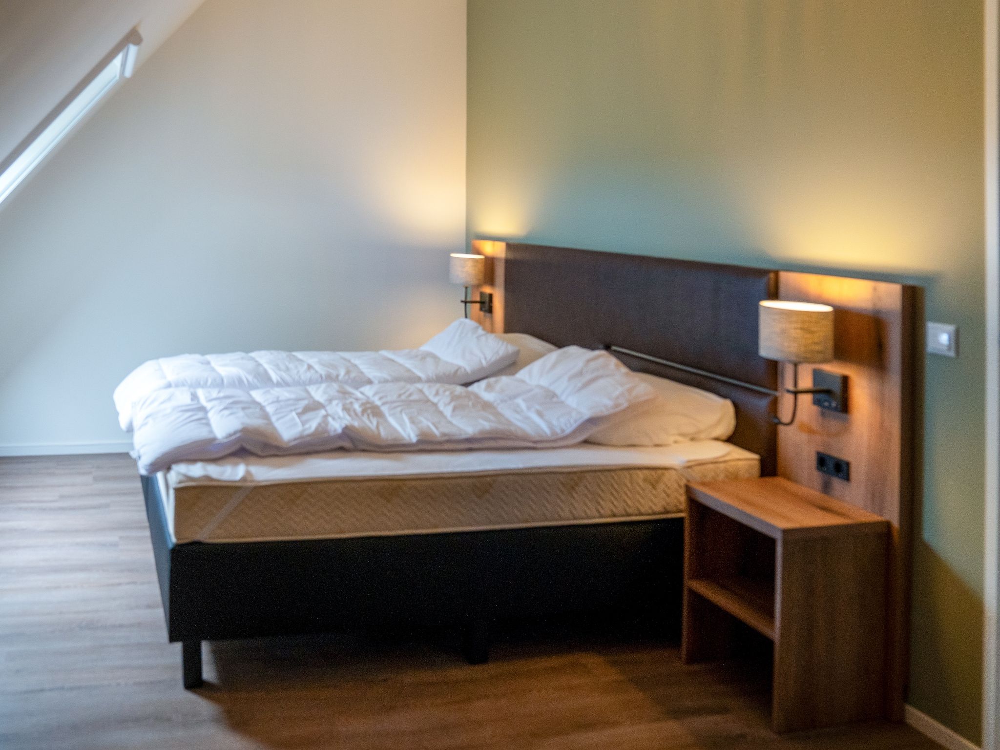 Een slaapkamer van 20 persoons villa in Leons