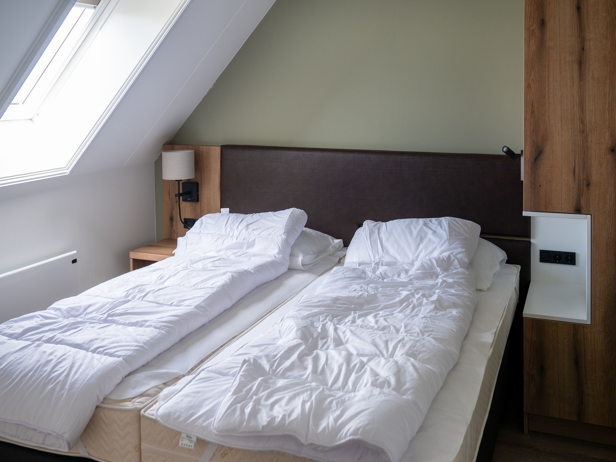 Een slaapkamer van 20 persoons villa in Leons