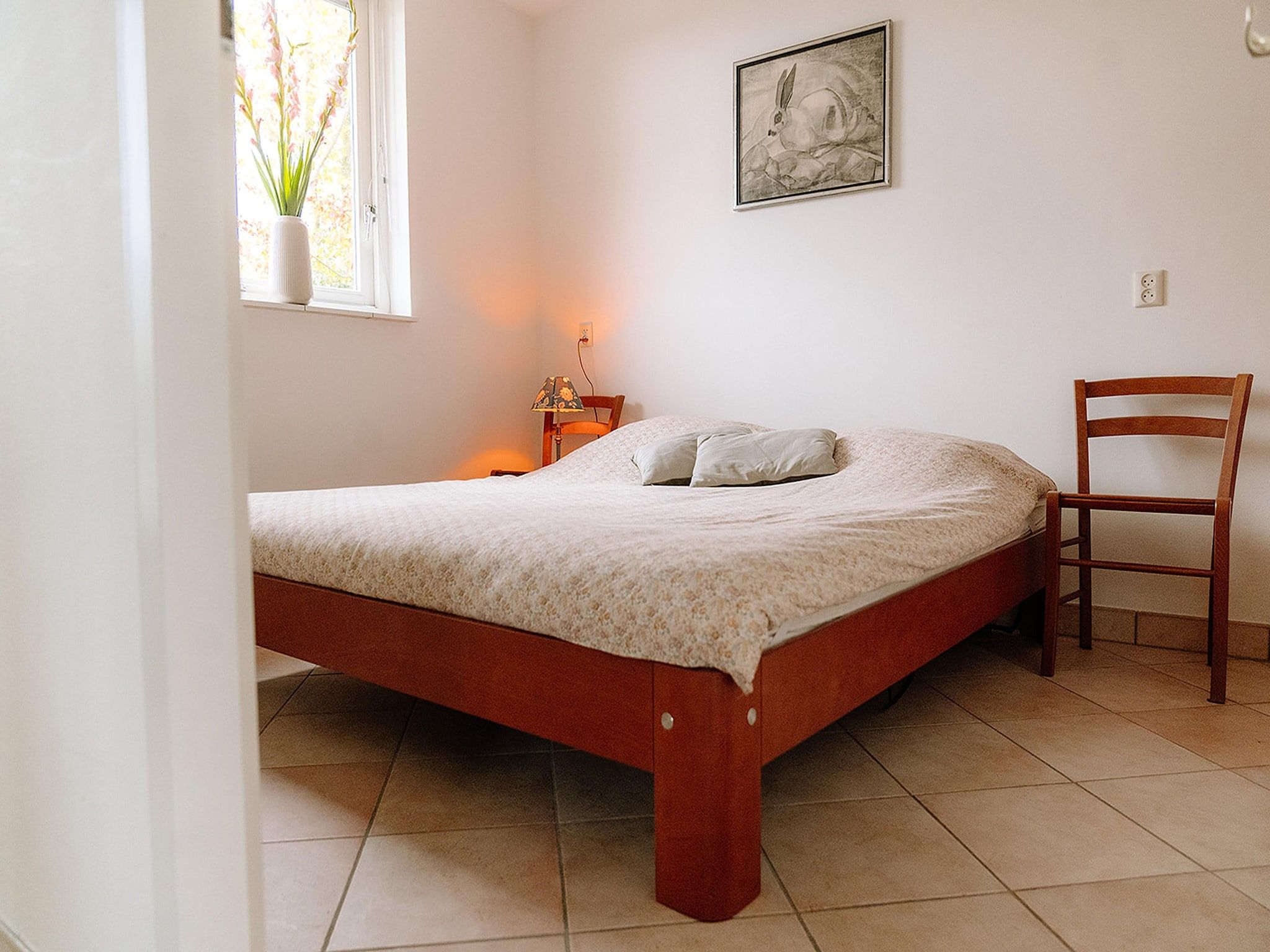 Een slaapkamer van De Wetterkant in Grou