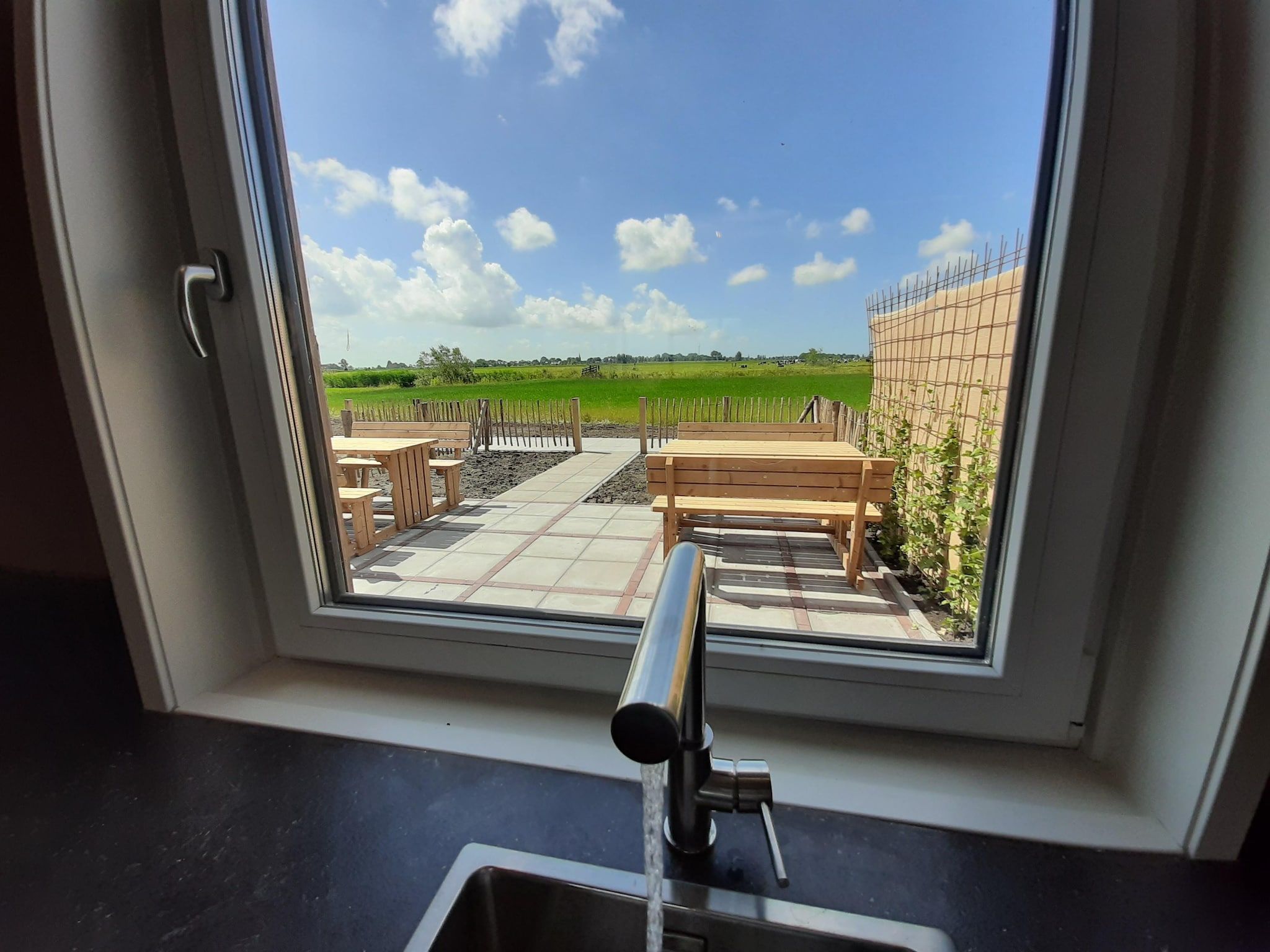 Het uitzicht vanaf combinatie van 2x 10 persoons woning in Leons