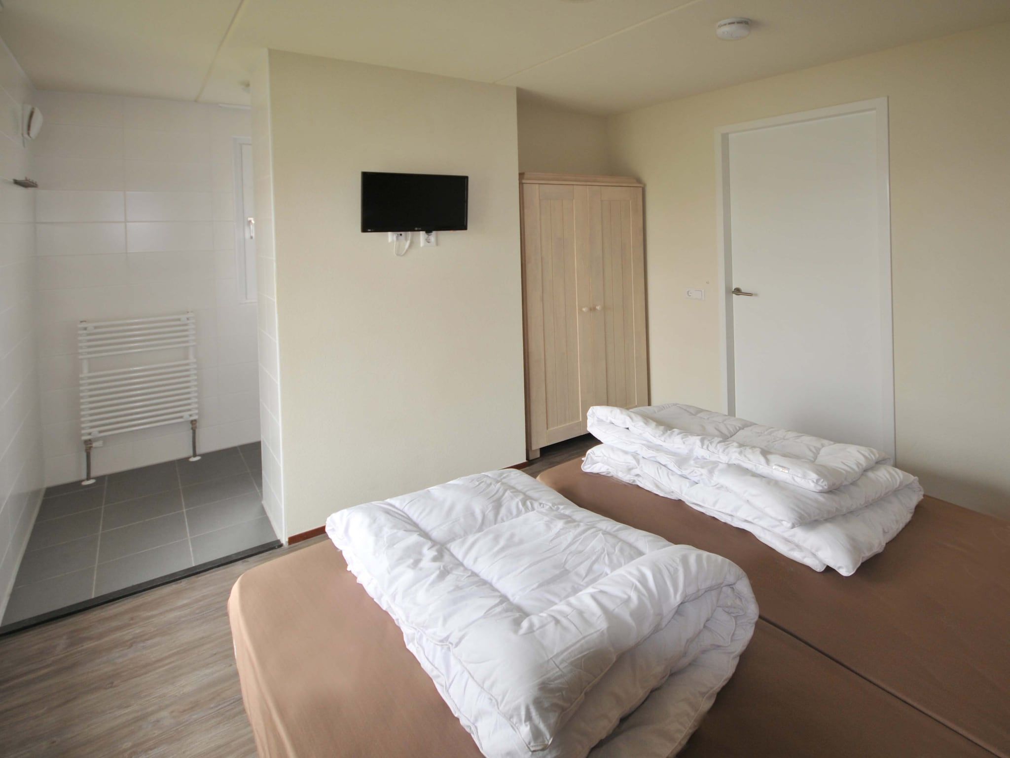 Een slaapkamer van Noordzee Residence Cadzand-Bad 37 in Cadzand-Bad