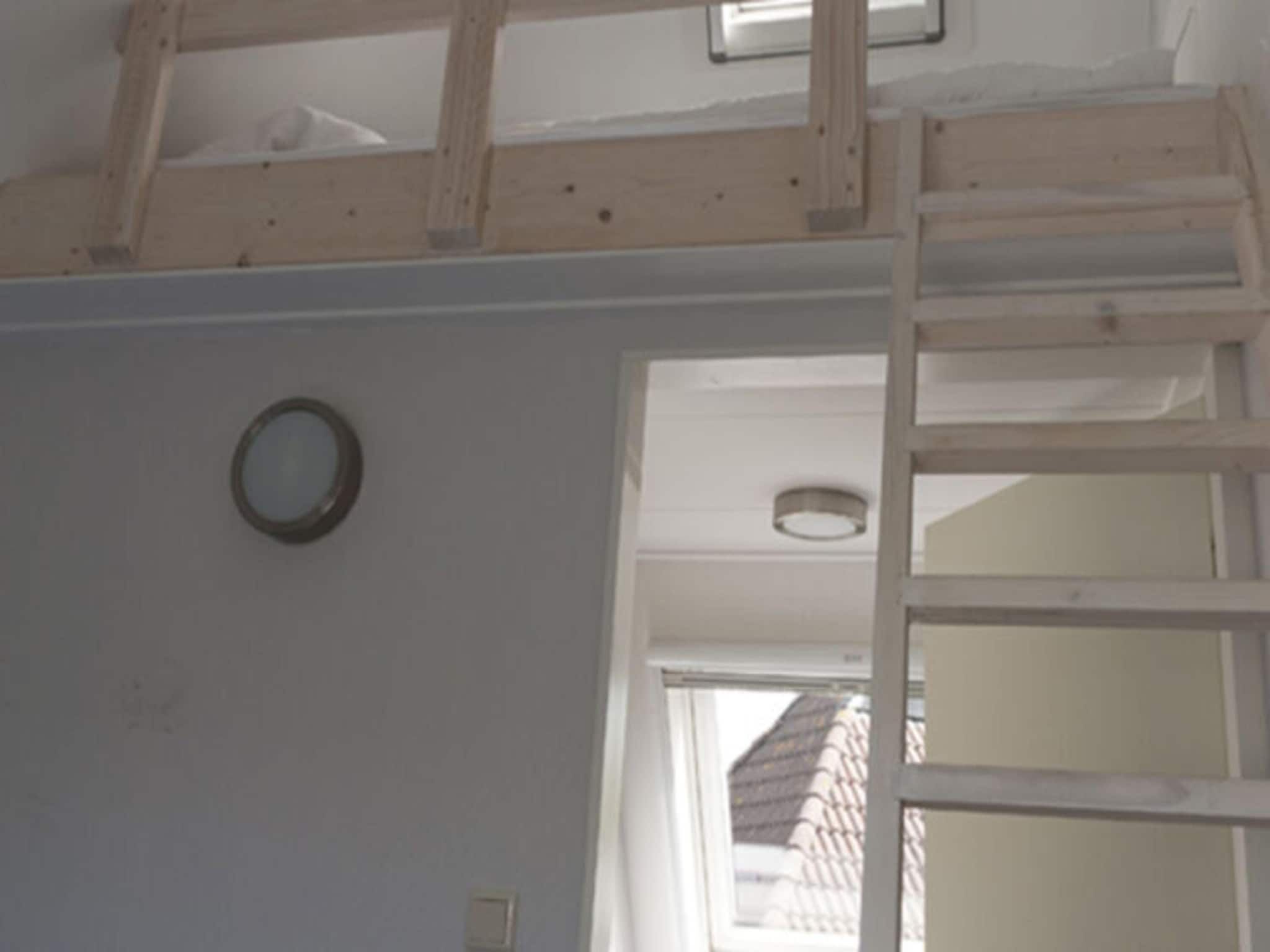 Een slaapkamer van Grand Tolve Wellness de luxe met sauna buitenspa & sloep in Earnewald