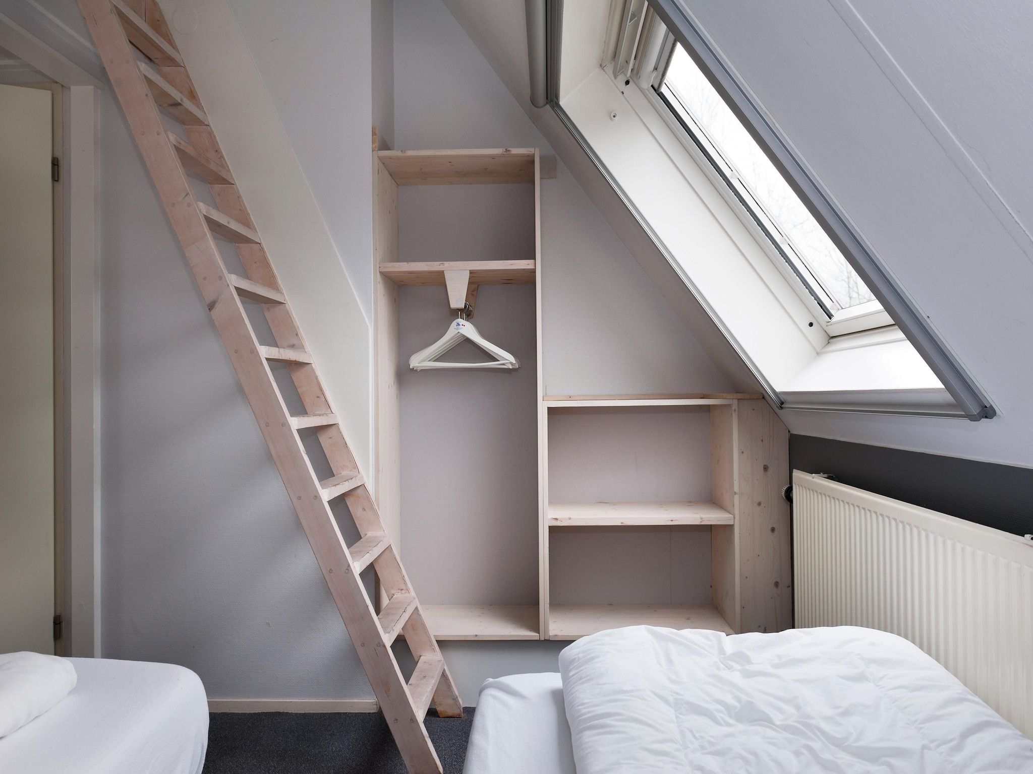 Een slaapkamer van Grand Tolve Wellness de luxe met sauna buitenspa in Earnewald