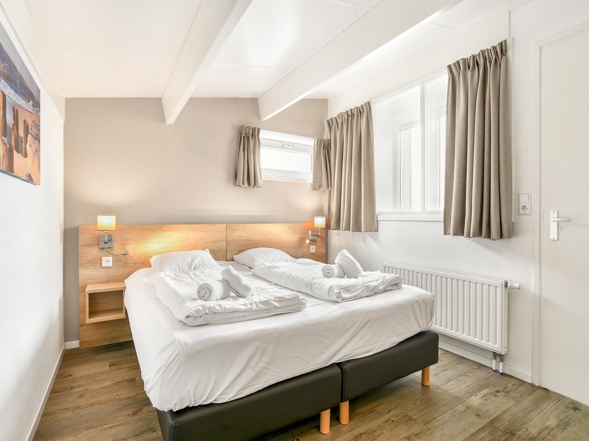 Een slaapkamer van Parc Port Greve 19 in Brouwershaven