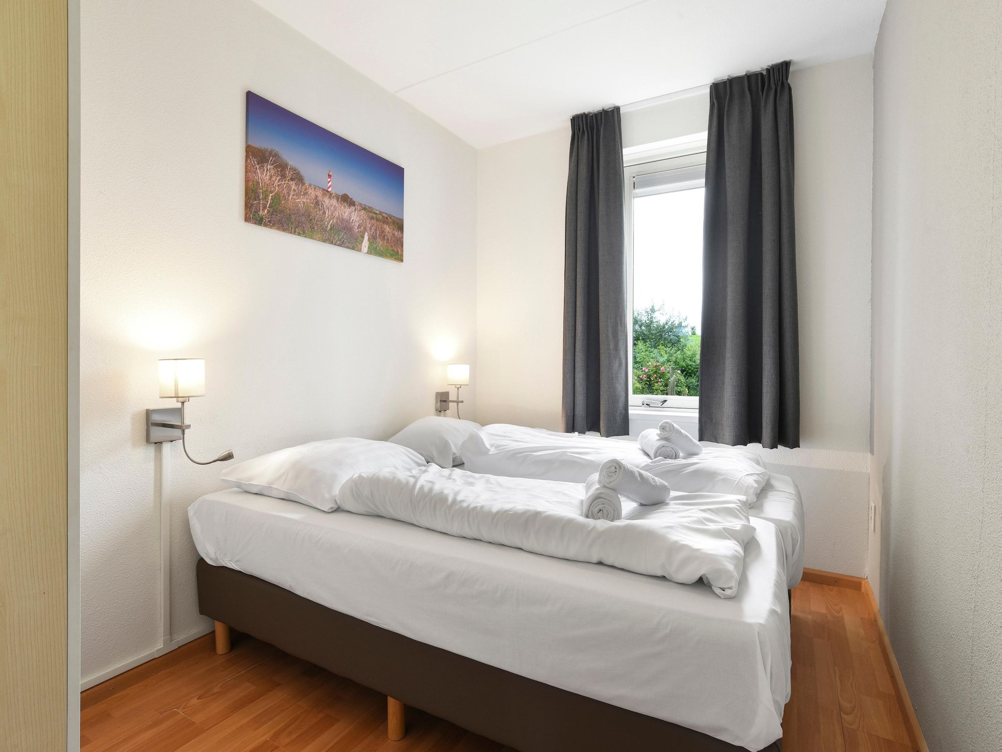 Een slaapkamer van Parc Port Greve 21 in Brouwershaven