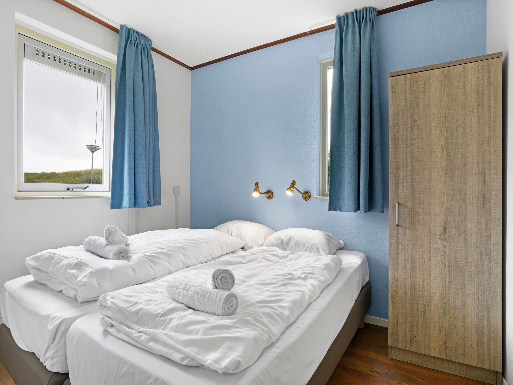 Een slaapkamer van Parc Port Greve 22 in Brouwershaven