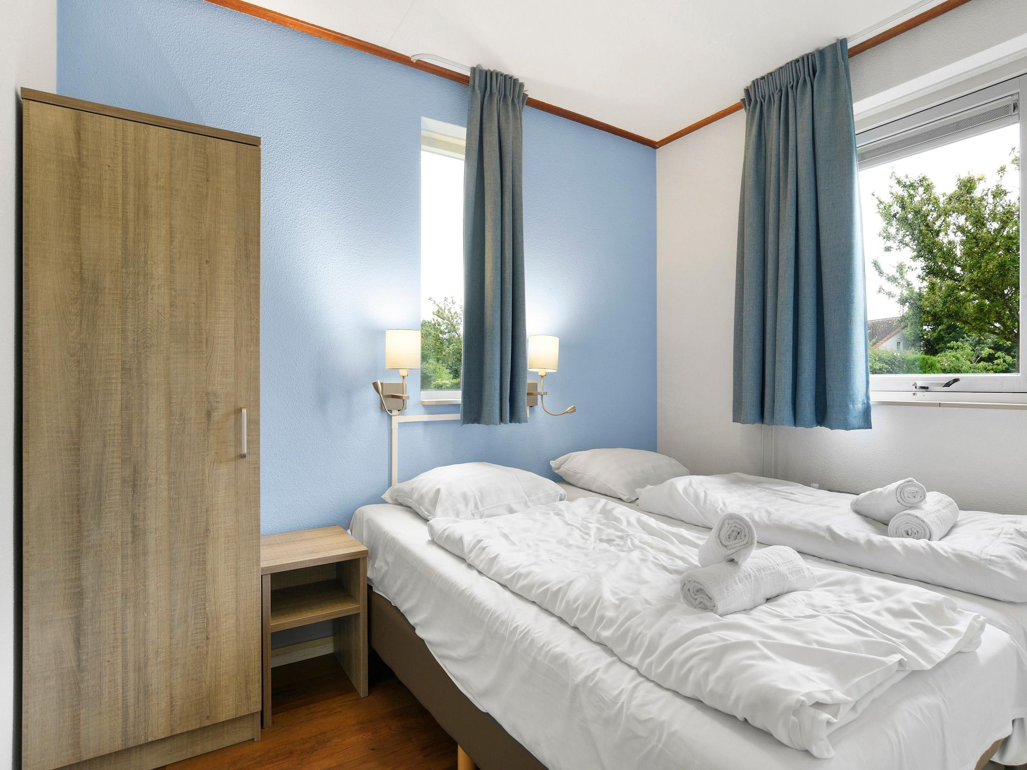 Een slaapkamer van Parc Port Greve 22 in Brouwershaven