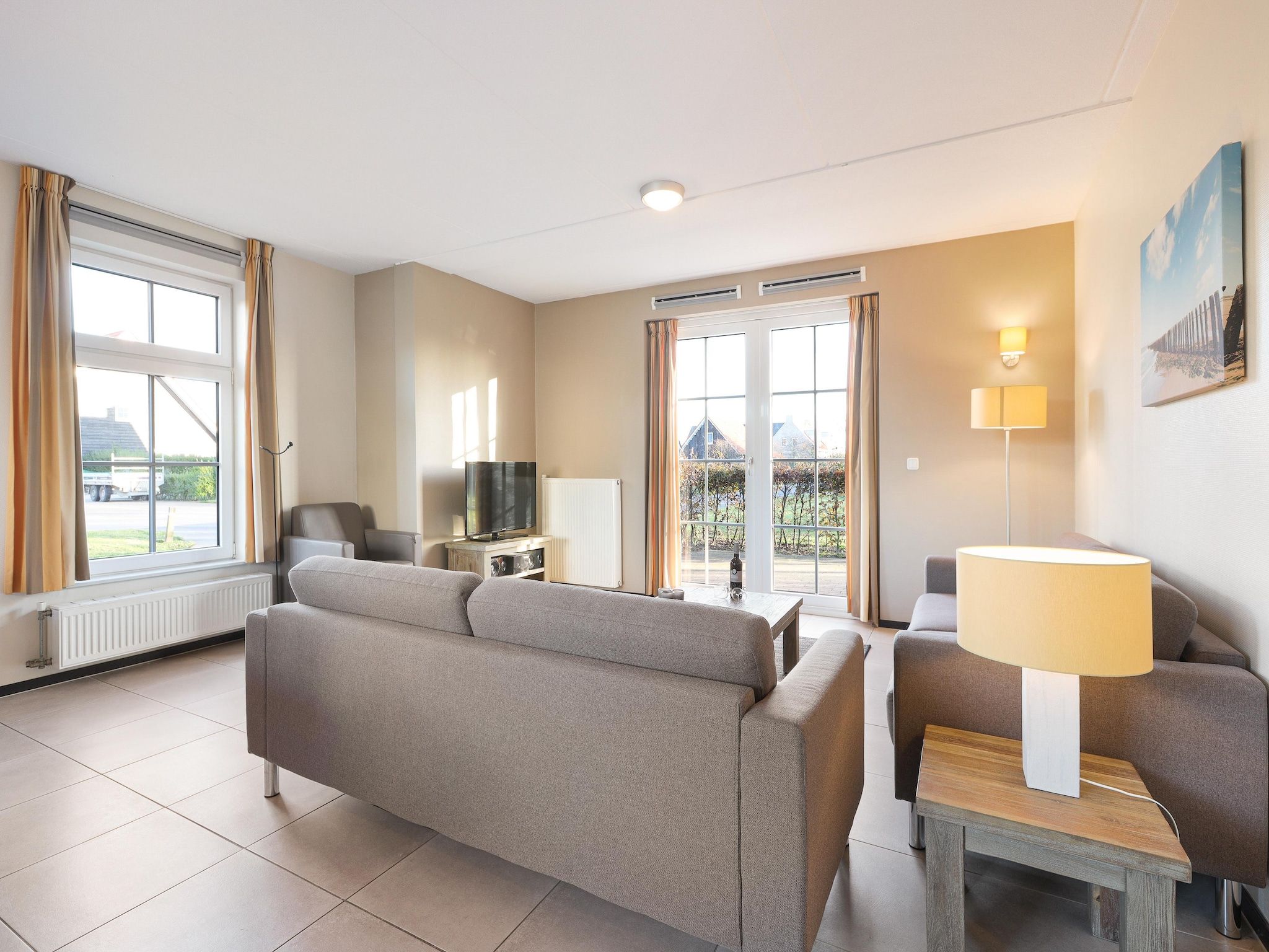 De woonkamer van Strand Resort Nieuwvliet-Bad 12 in Nieuwvliet