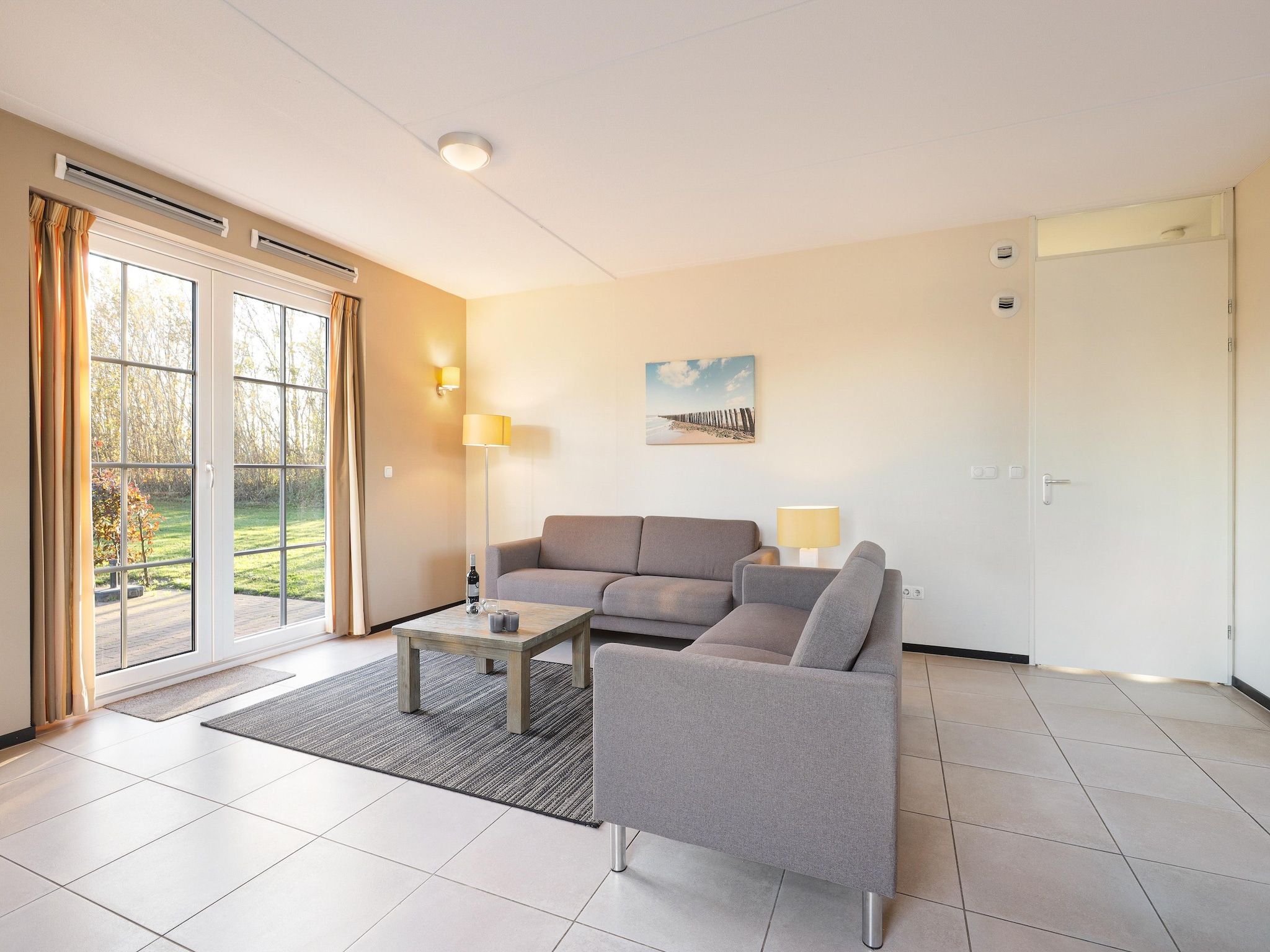 De woonkamer van Strand Resort Nieuwvliet-Bad 12 in Nieuwvliet