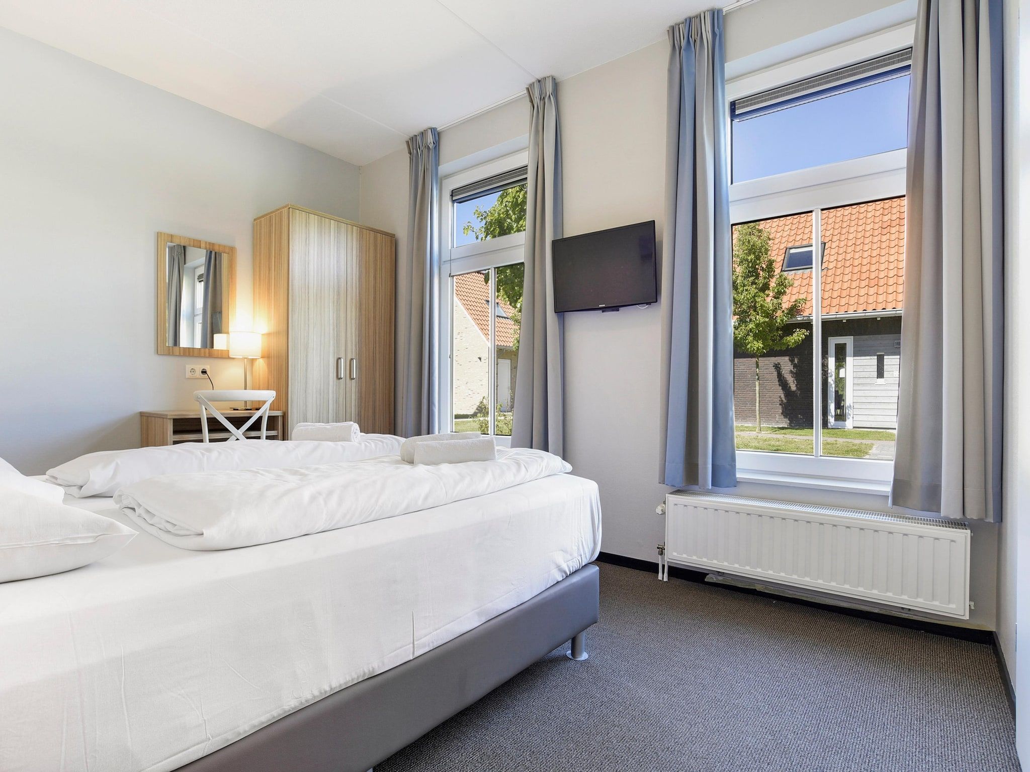 Een slaapkamer van Strand Resort Nieuwvliet-Bad 13 in Nieuwvliet