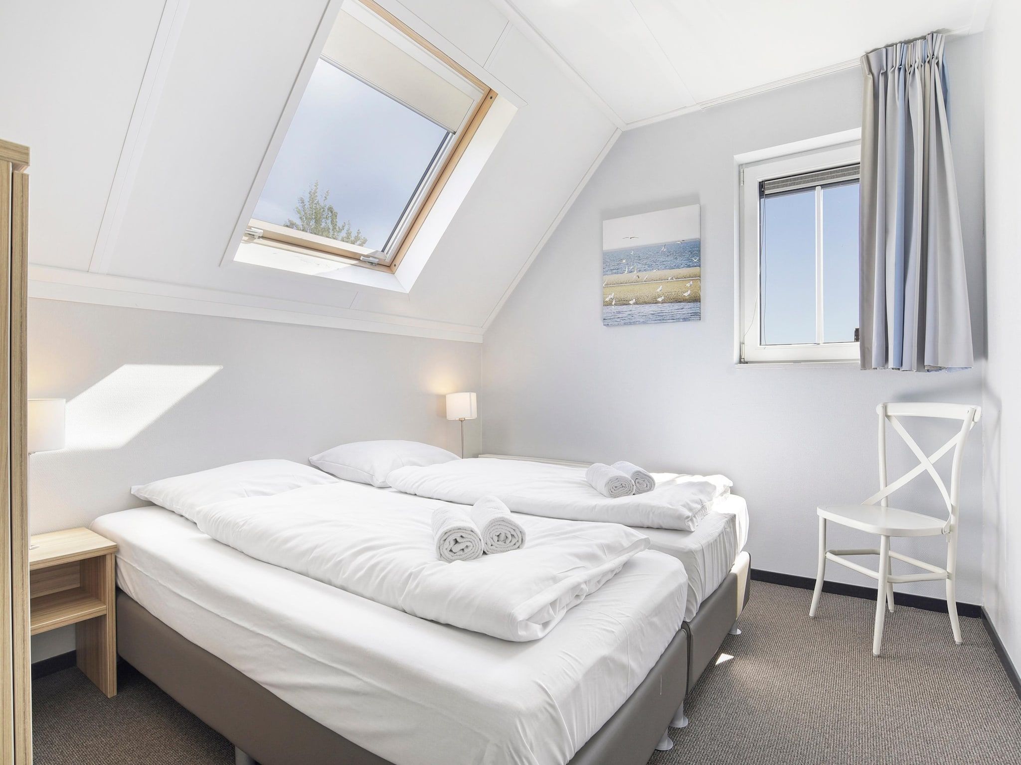 Een slaapkamer van Strand Resort Nieuwvliet-Bad 13 in Nieuwvliet