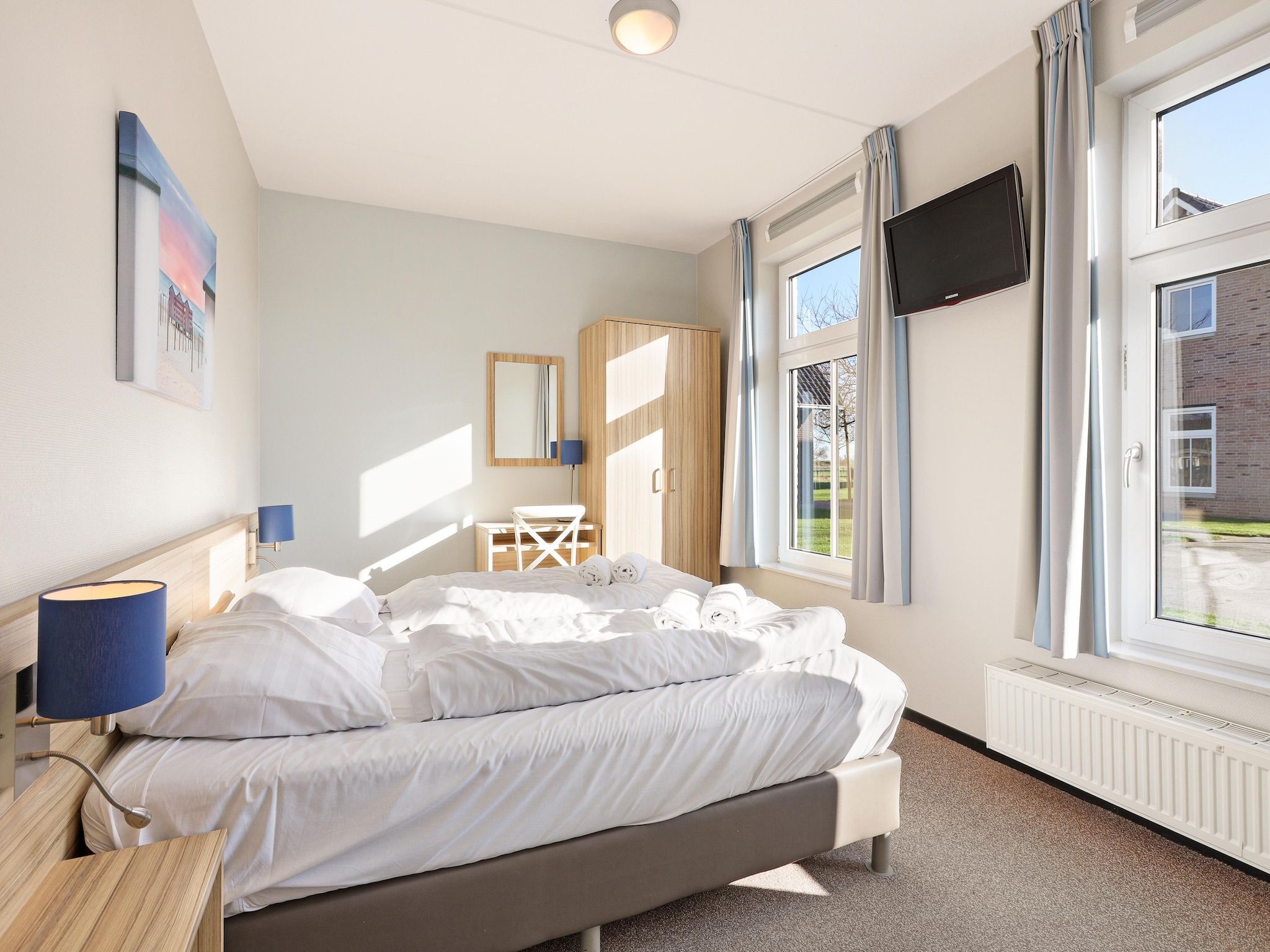 Een slaapkamer van Strand Resort Nieuwvliet-Bad 13 in Nieuwvliet