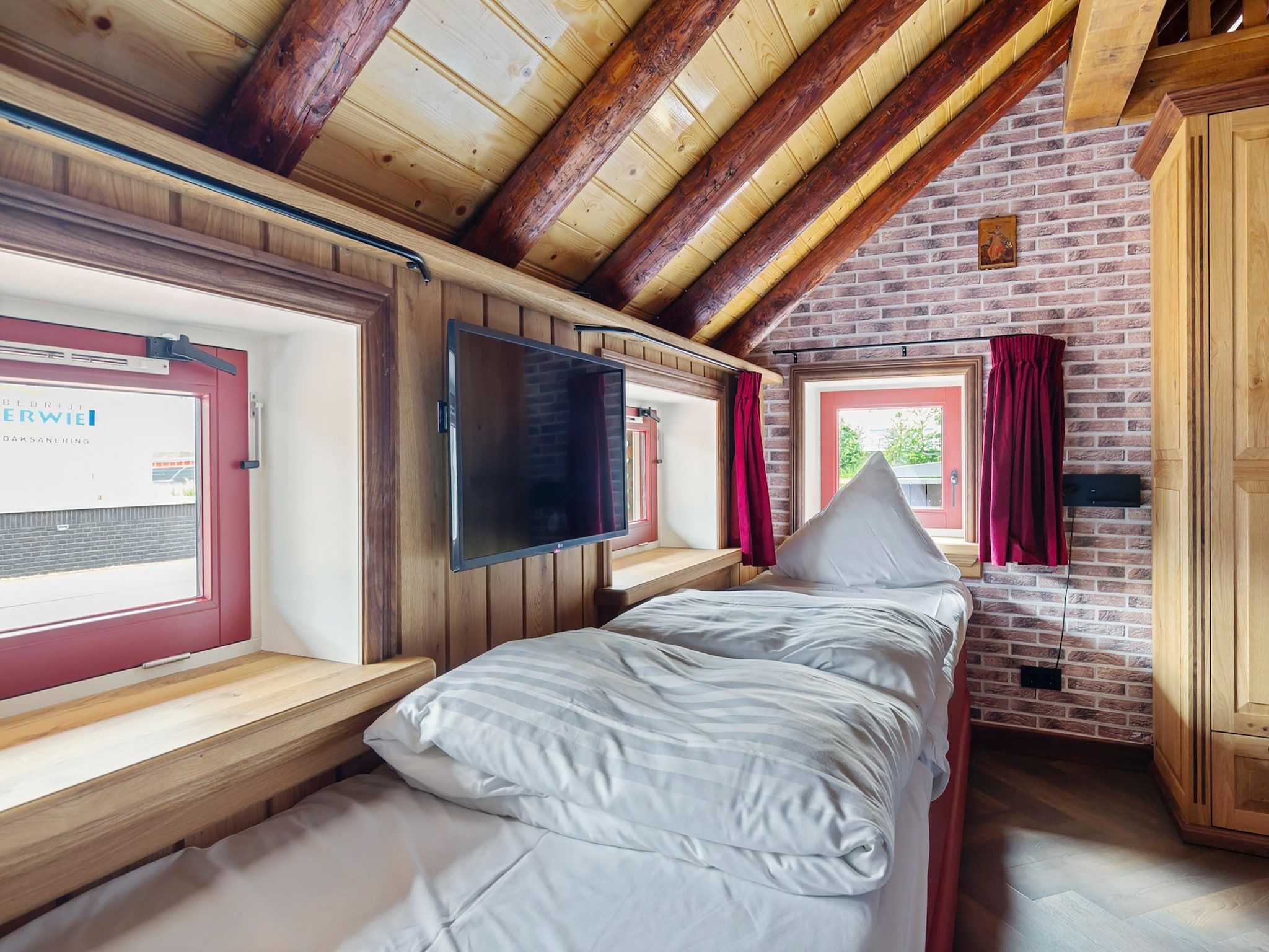 Een slaapkamer van Oane's Huske in Jistrum / Skûlenboarch