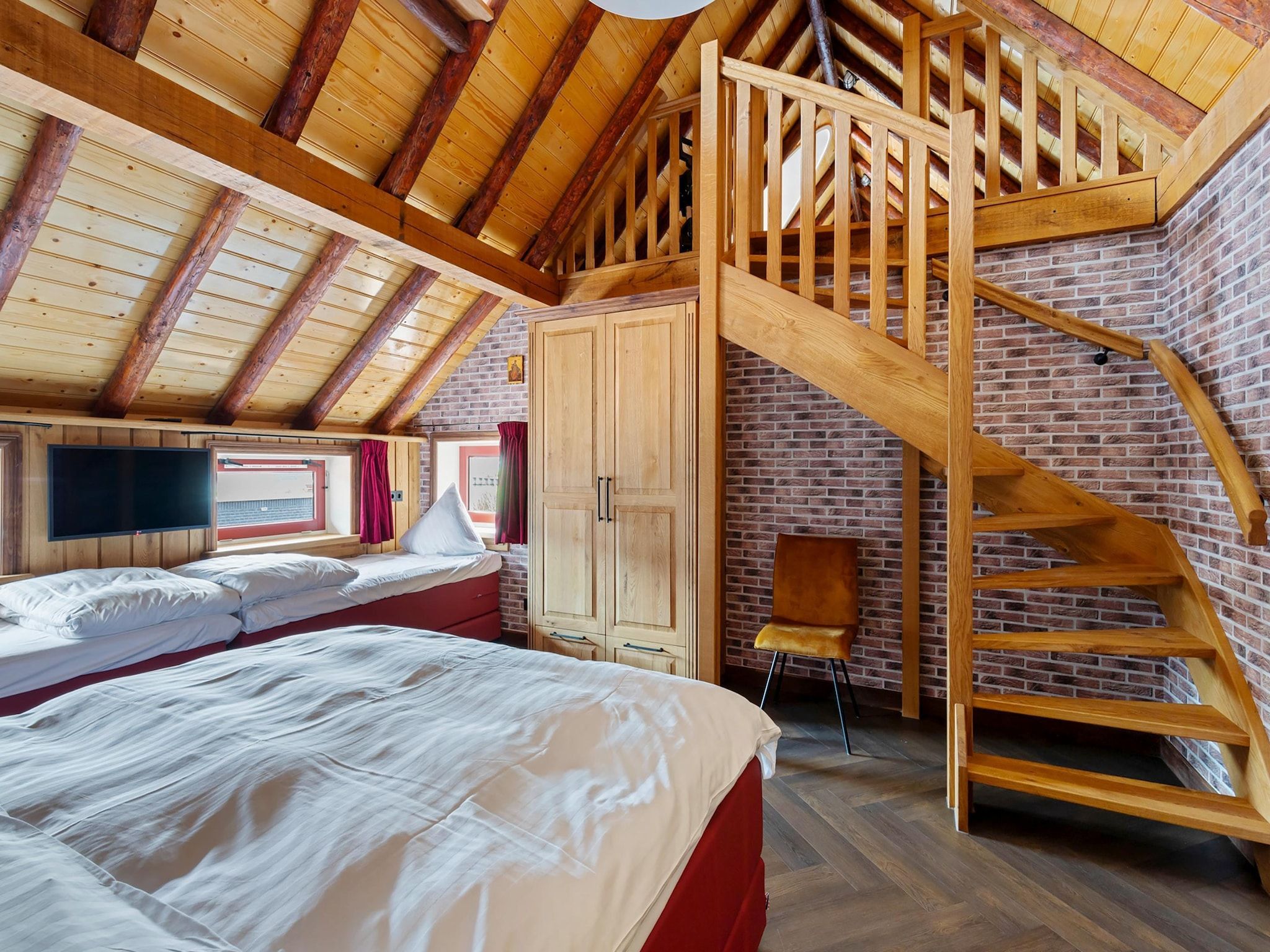 Een slaapkamer van Oane's Huske in Jistrum / Skûlenboarch