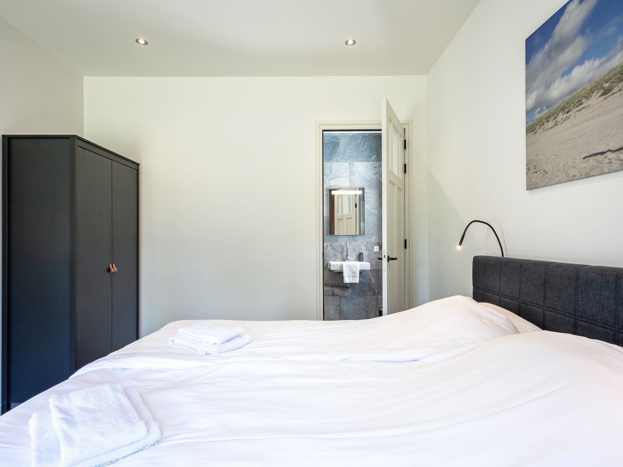 Een slaapkamer van Familievilla Nieuw-Zeeland in Oosterend