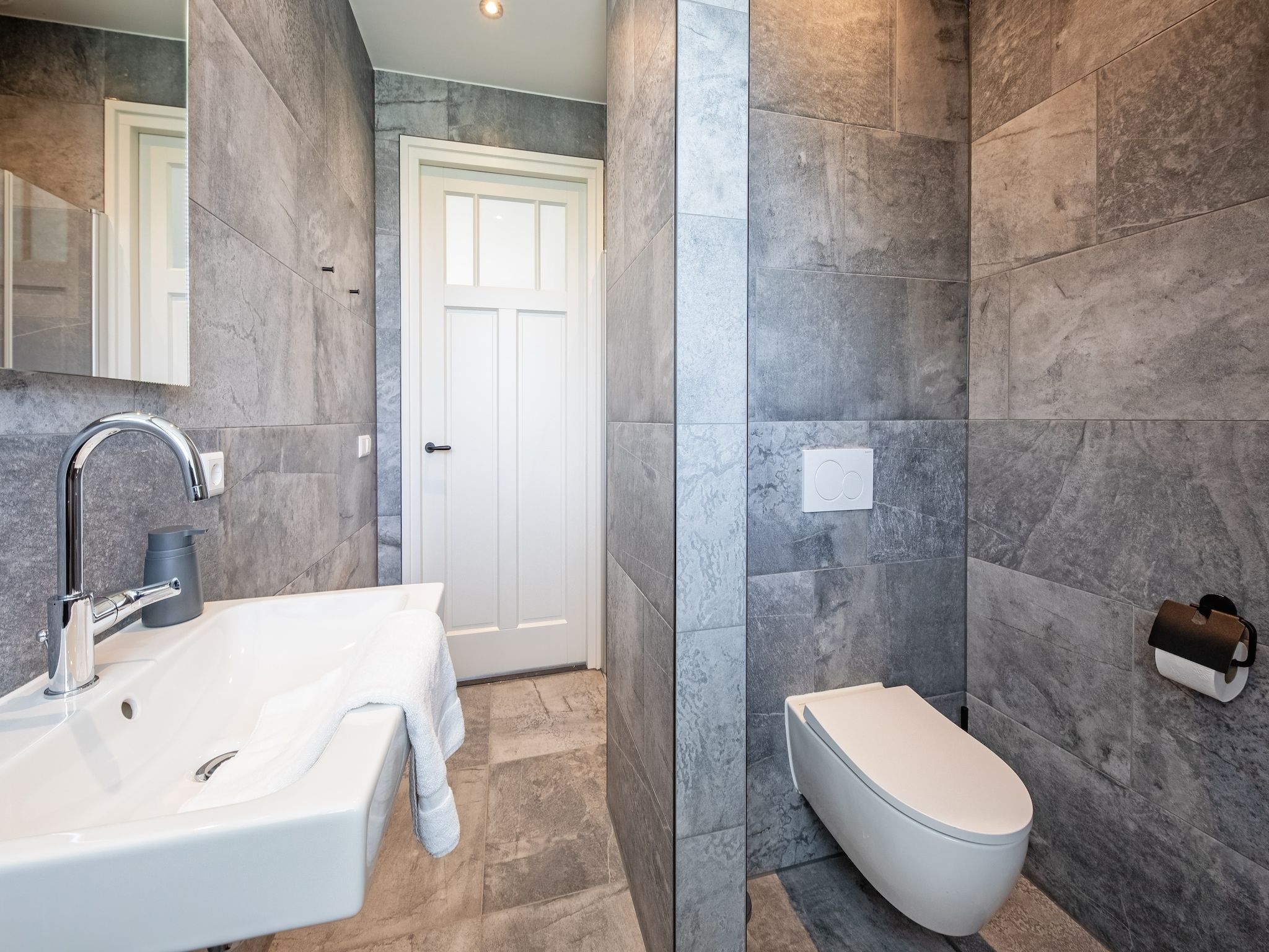 De badkamer van Familievilla Nieuw-Zeeland in Oosterend