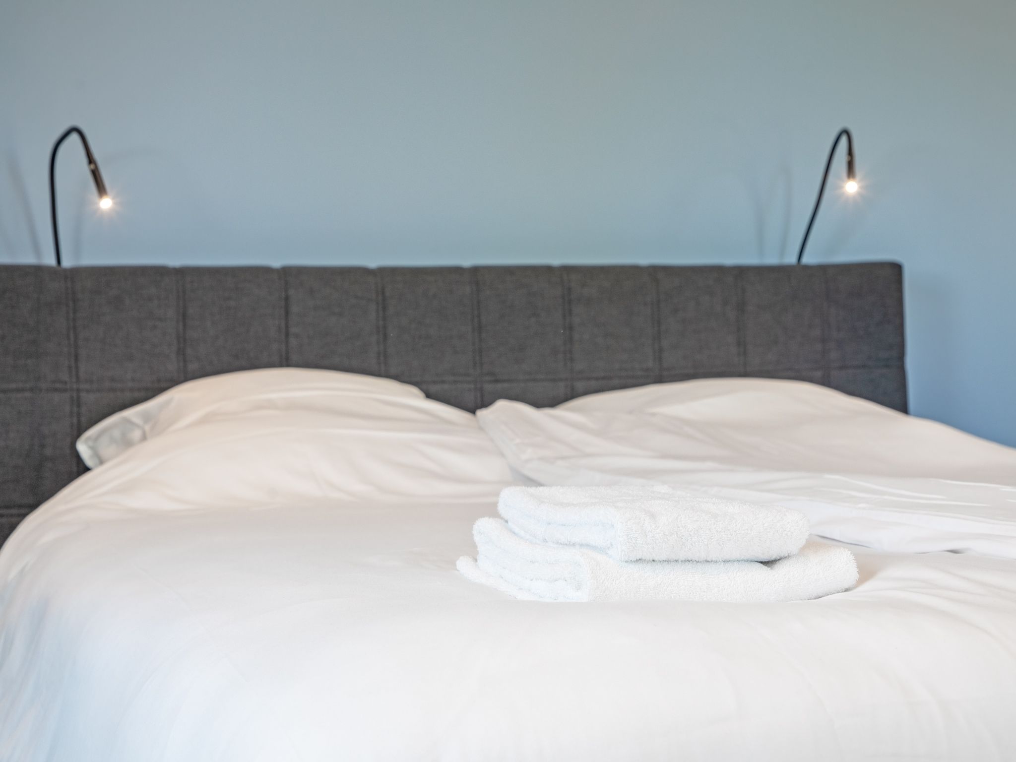 Een slaapkamer van Familievilla Nieuw-Zeeland in Oosterend