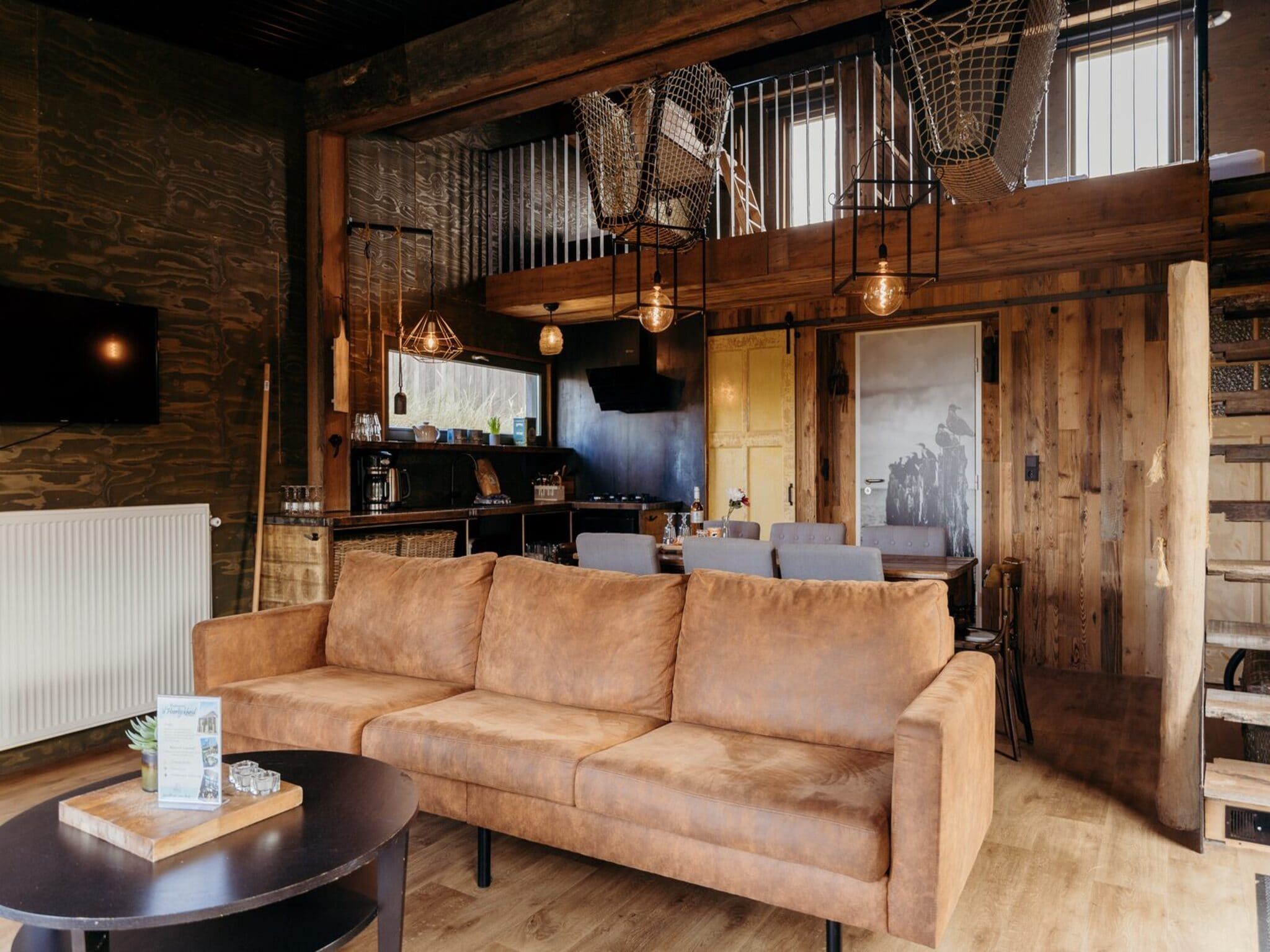 De woonkamer van Juttershut Duynpark - Callantsoog in Callantsoog