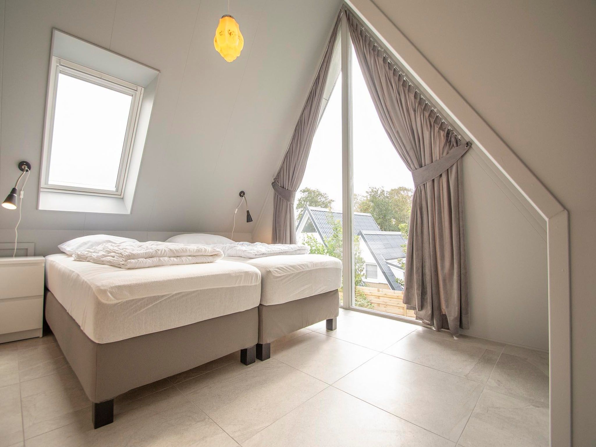 Een slaapkamer van Sandepark 171 in Callantsoog