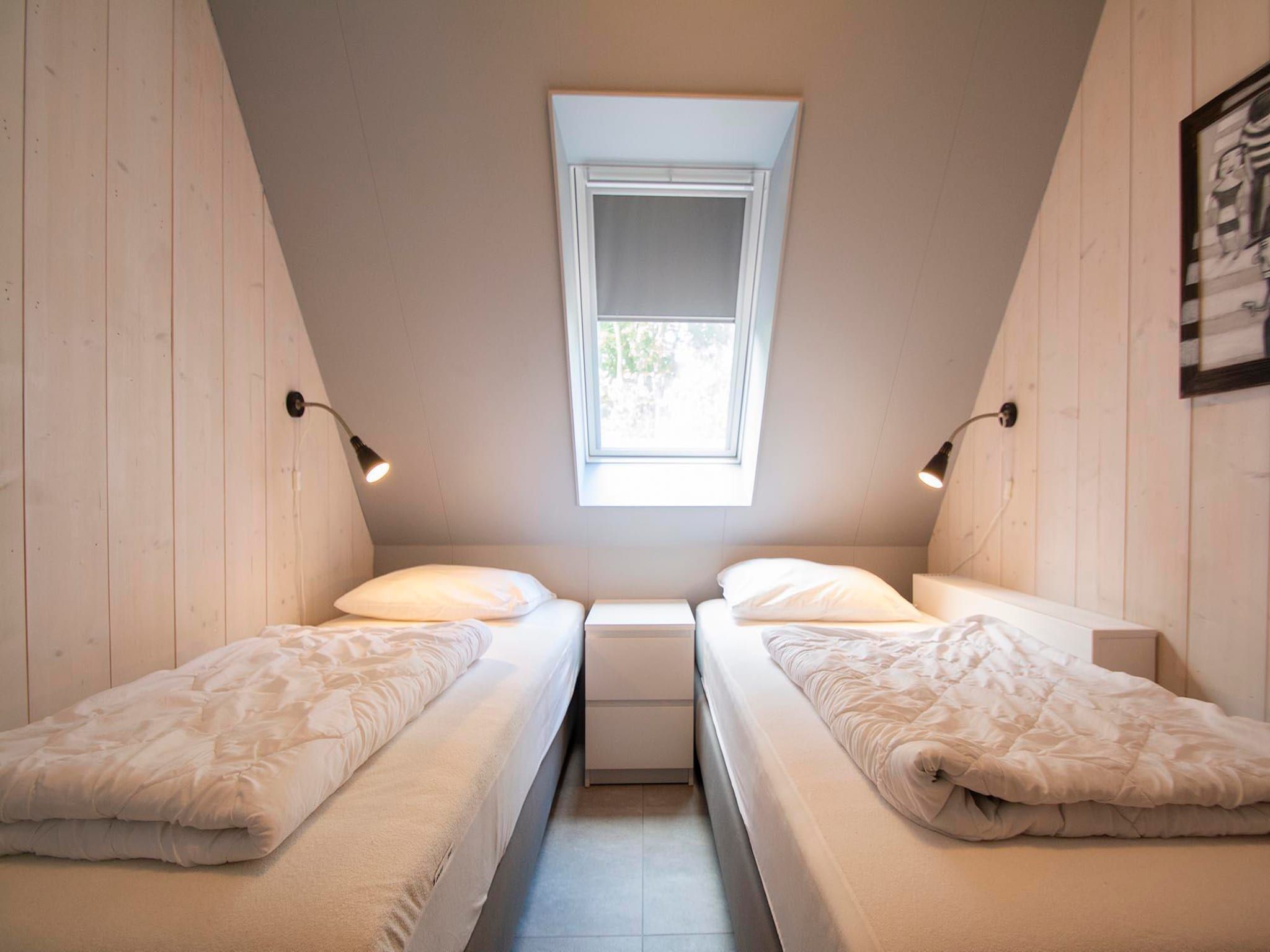 Een slaapkamer van Sandepark 171 in Callantsoog