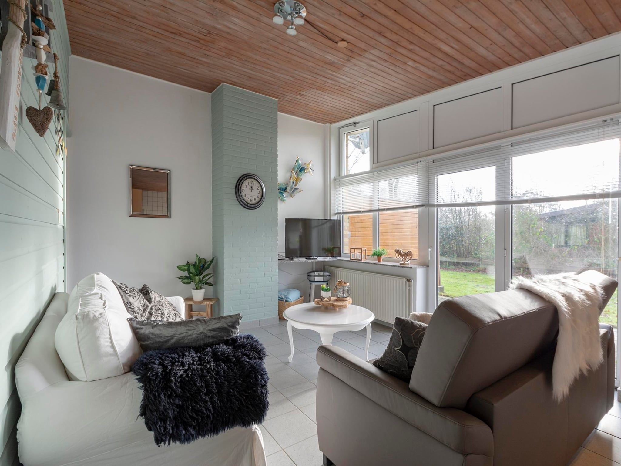 De woonkamer van Duinland XL in Sint Maartenszee