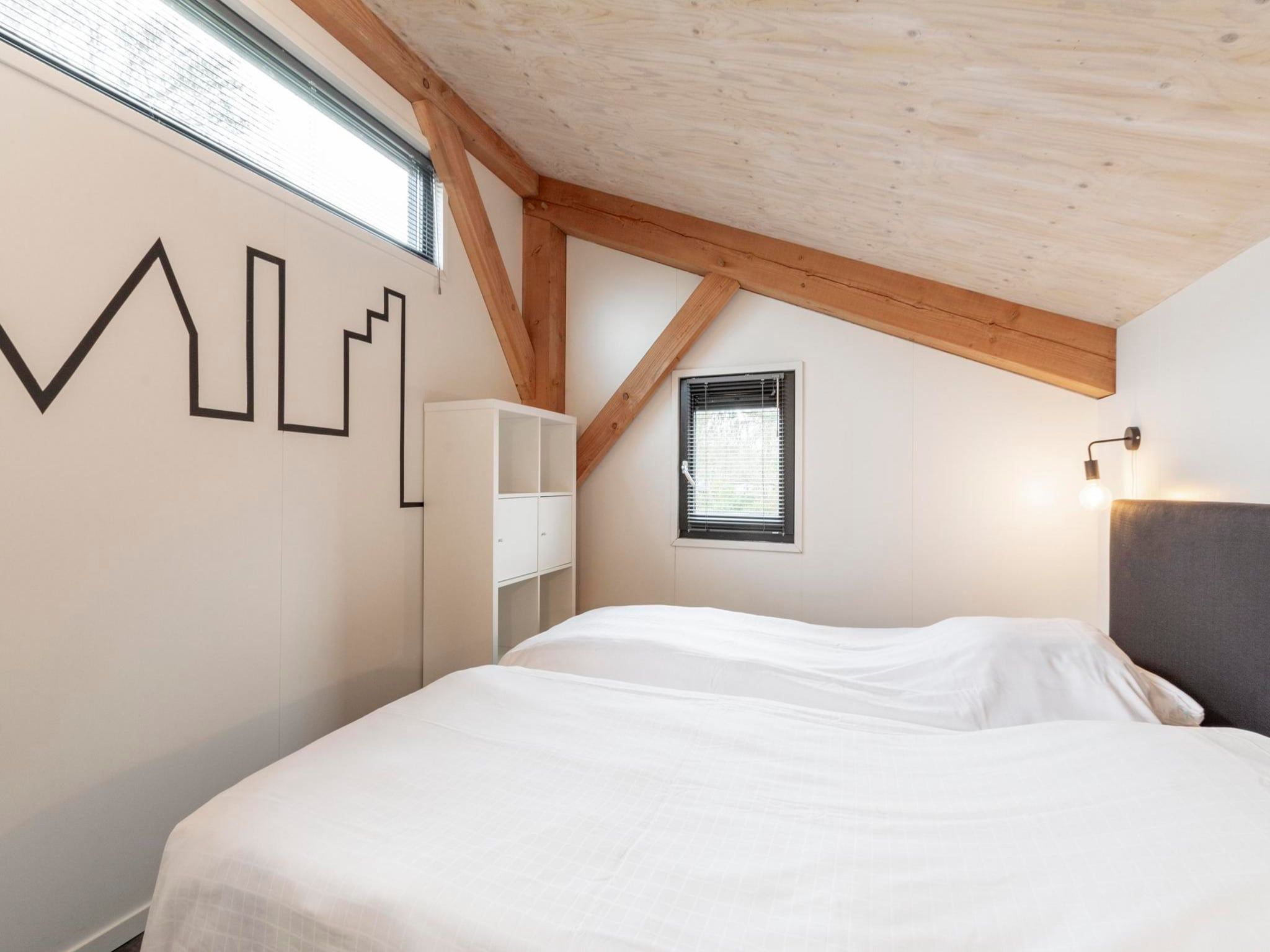 Een slaapkamer van Duinvink in Sint Maartenszee