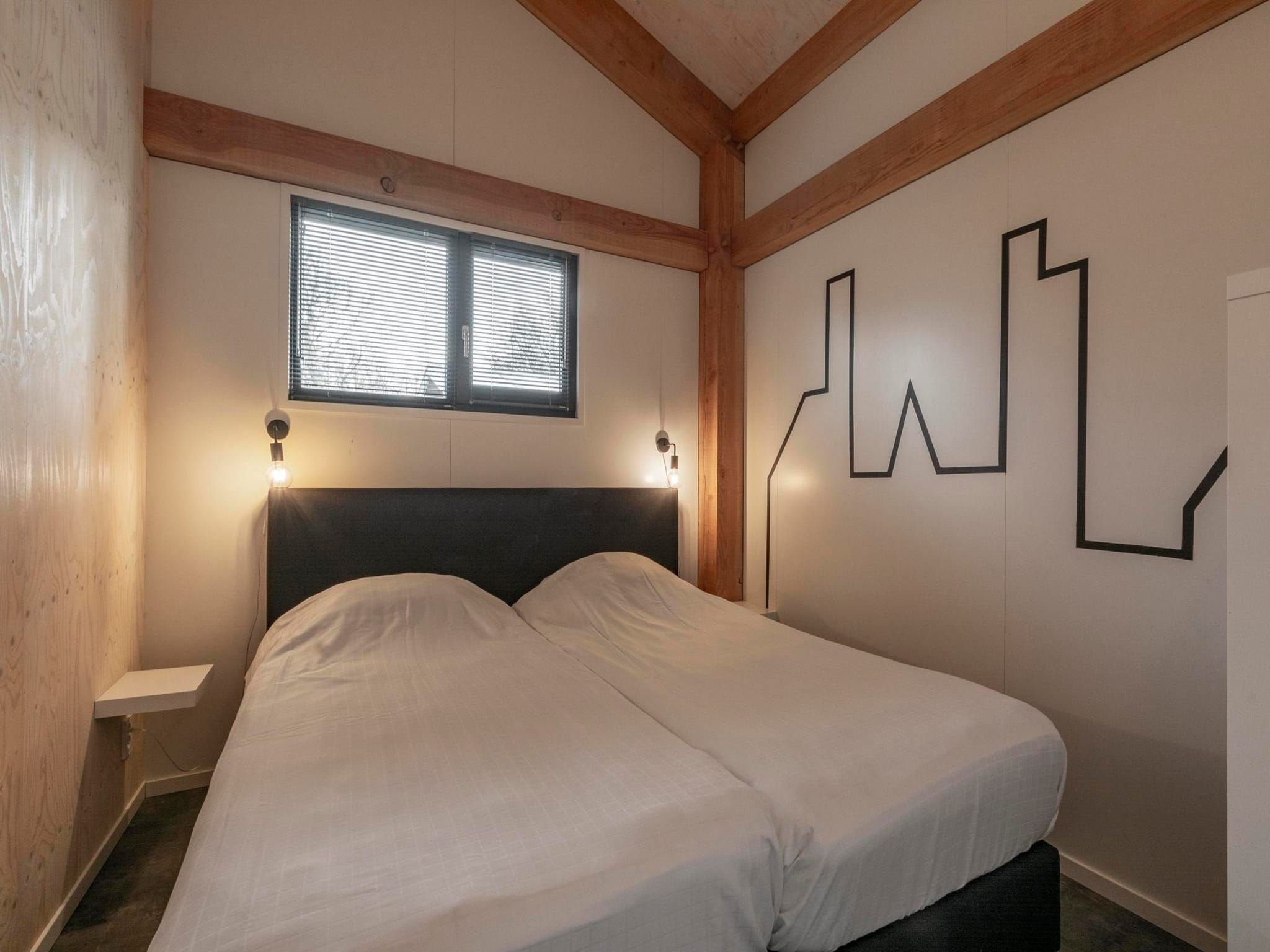 Een slaapkamer van Duinvink in Sint Maartenszee