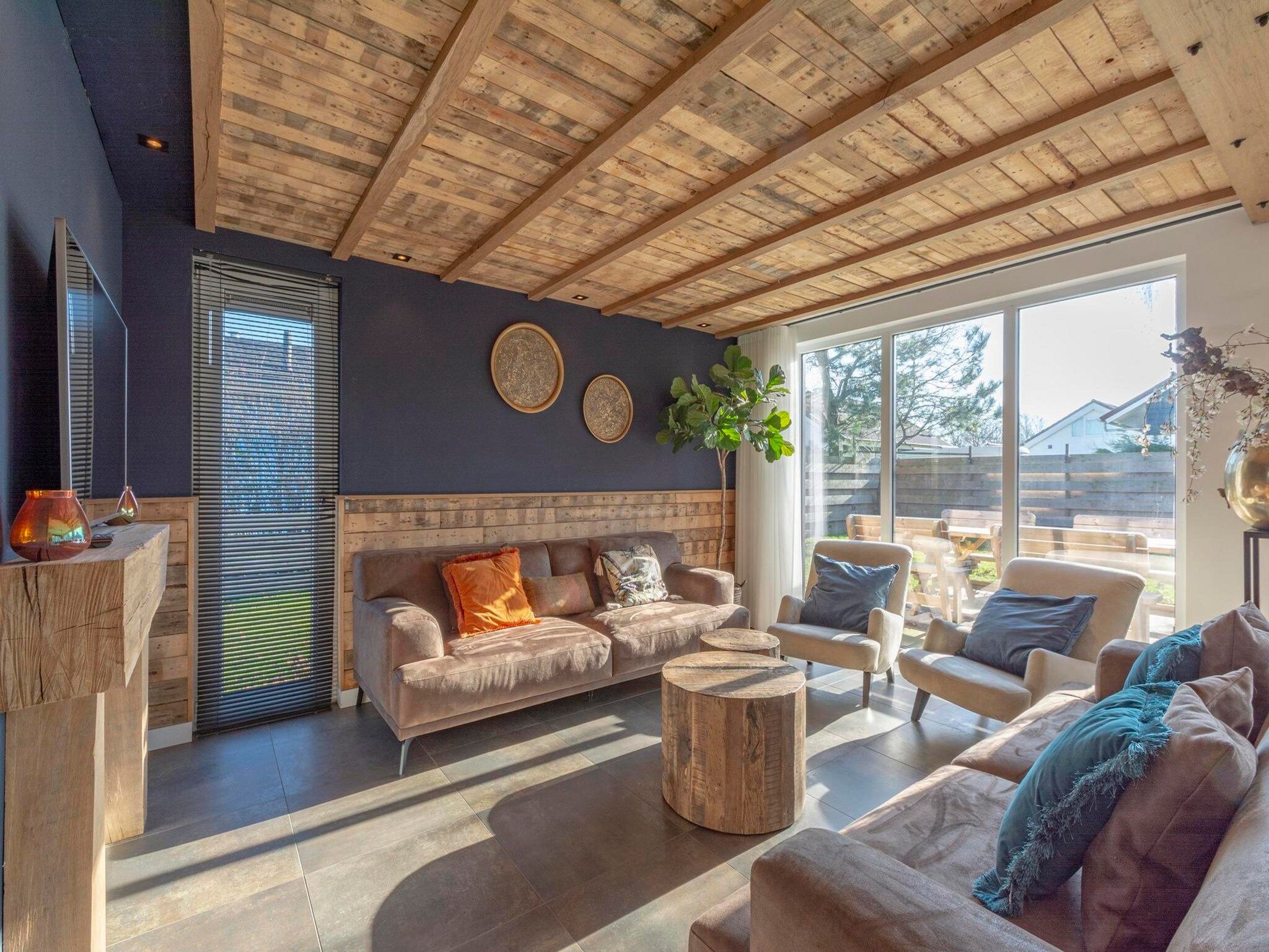 De woonkamer van Luxe Villa Keizerskroon - Keizerkroon 63 in Julianadorp aan Zee