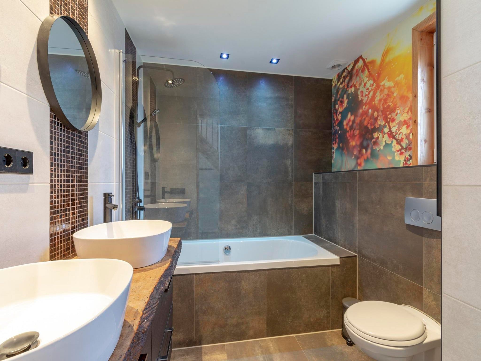 De badkamer van Luxe Villa Keizerskroon - Keizerkroon 63 in Julianadorp aan Zee