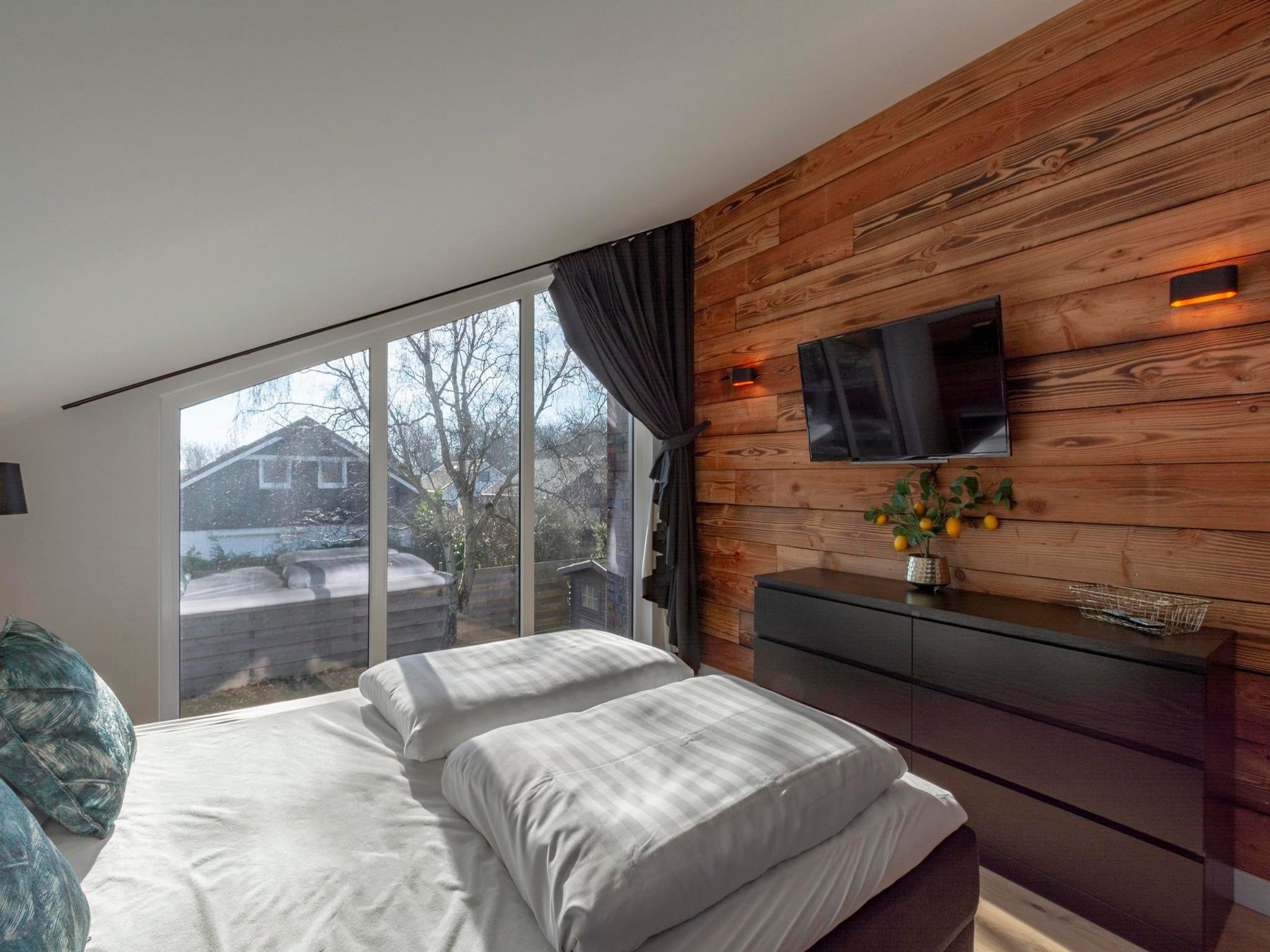 Een slaapkamer van Luxe Villa Keizerskroon - Keizerkroon 63 in Julianadorp aan Zee