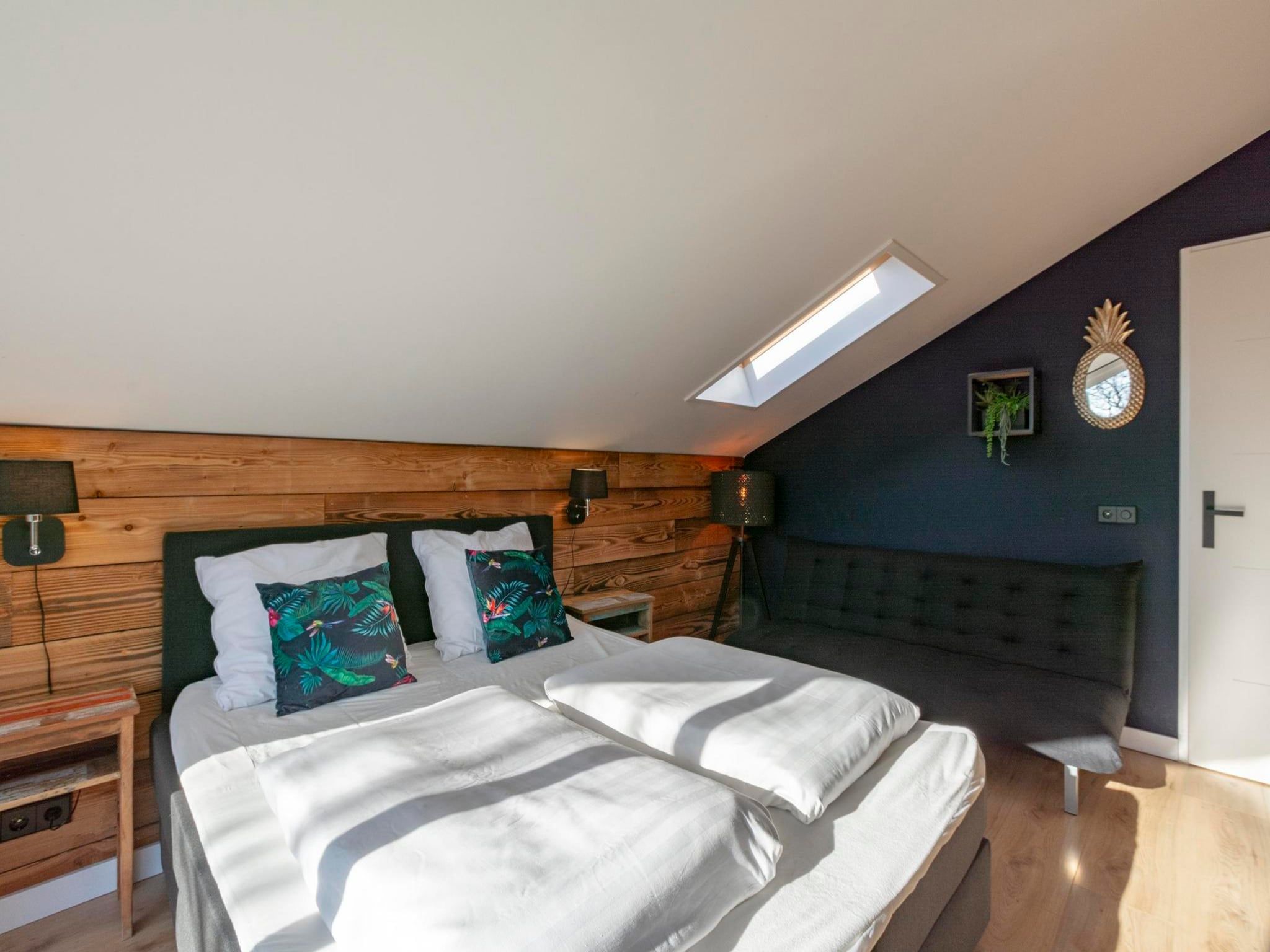 Een slaapkamer van Luxe Villa Keizerskroon - Keizerkroon 63 in Julianadorp aan Zee