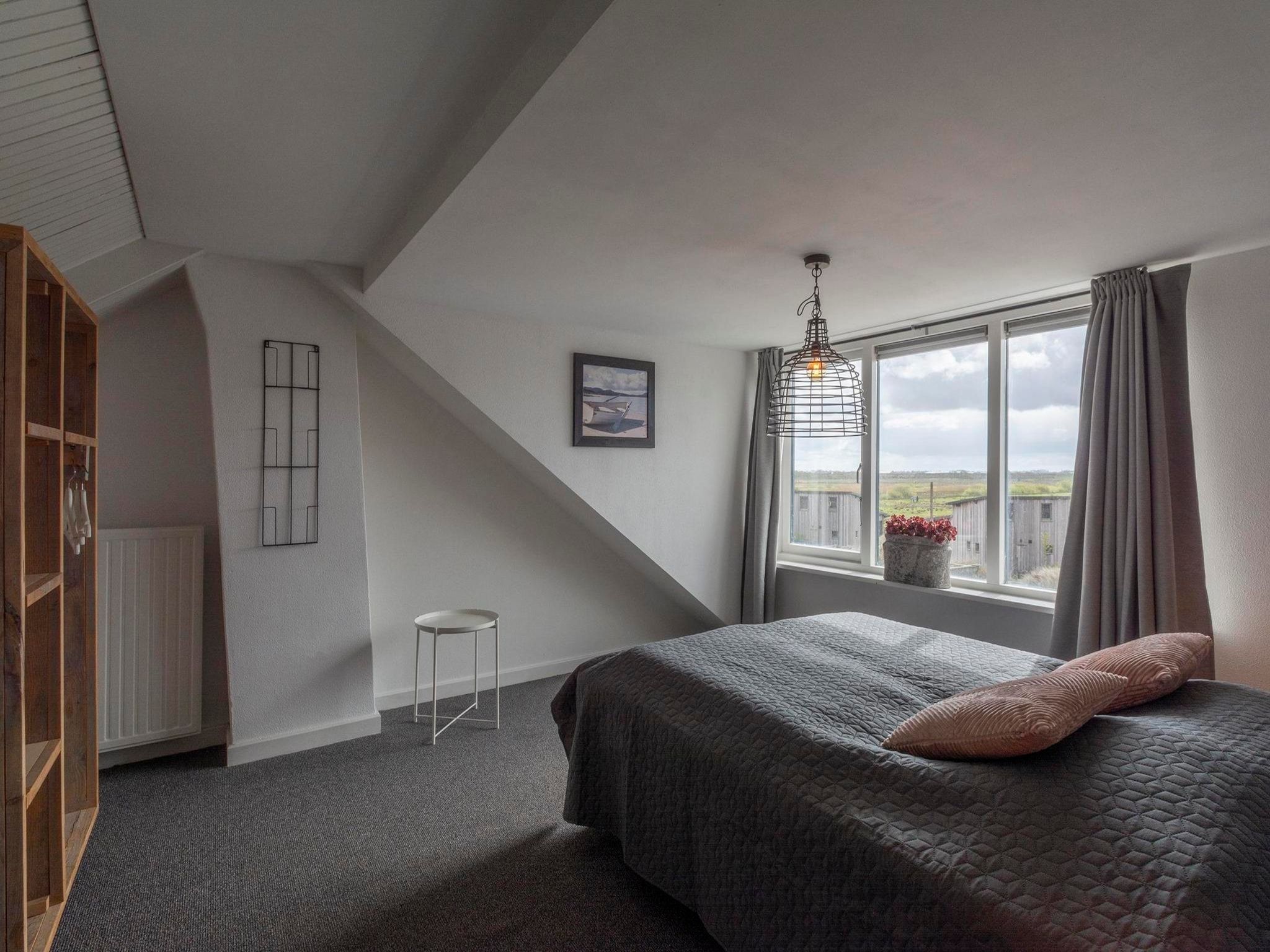 Een slaapkamer van Villa Zuidwester in Callantsoog