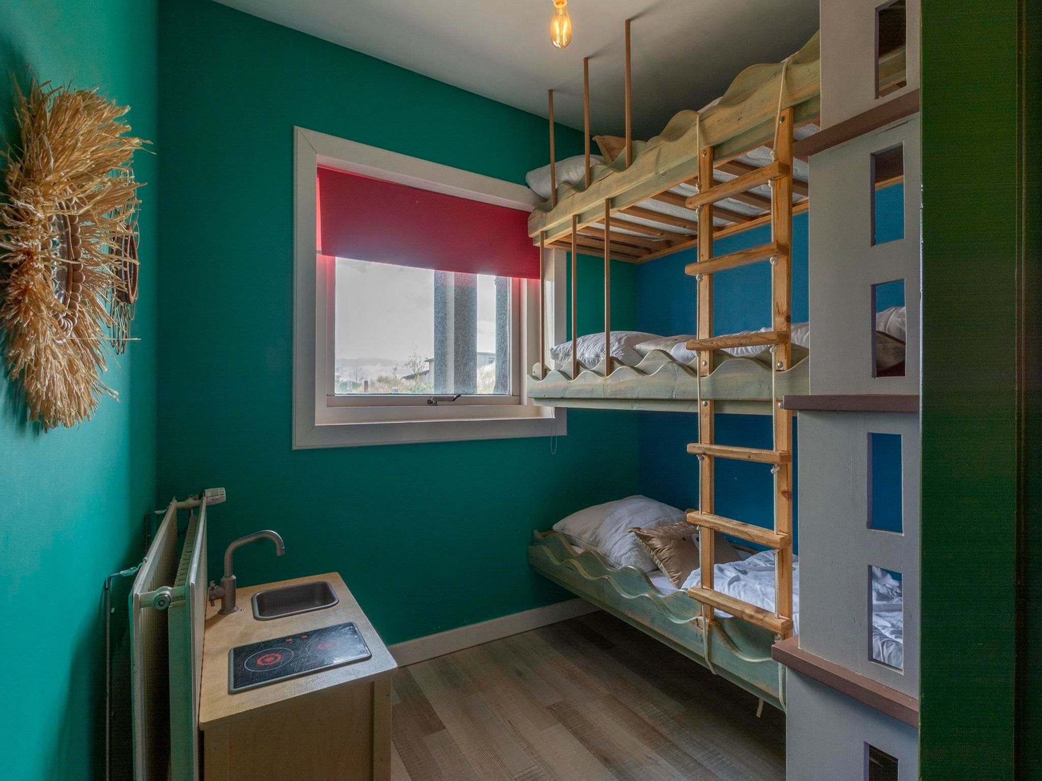 Een slaapkamer van Villa Zuidwester in Callantsoog