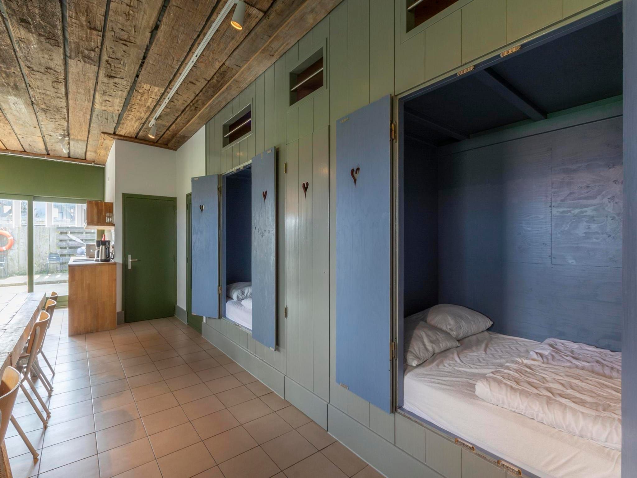 Een slaapkamer van Villa Zuidwester in Callantsoog