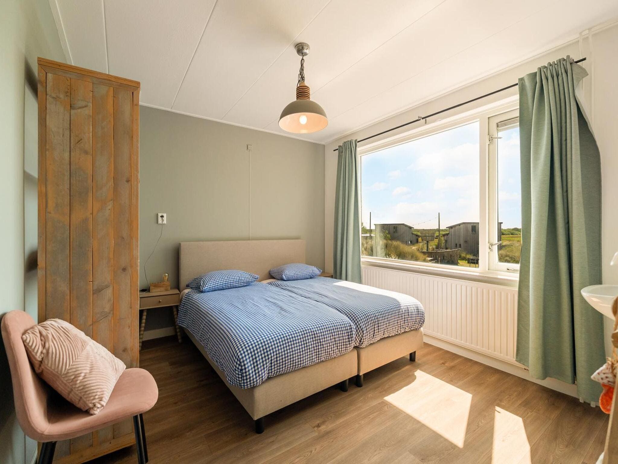 Een slaapkamer van Villa Zuidwester in Callantsoog